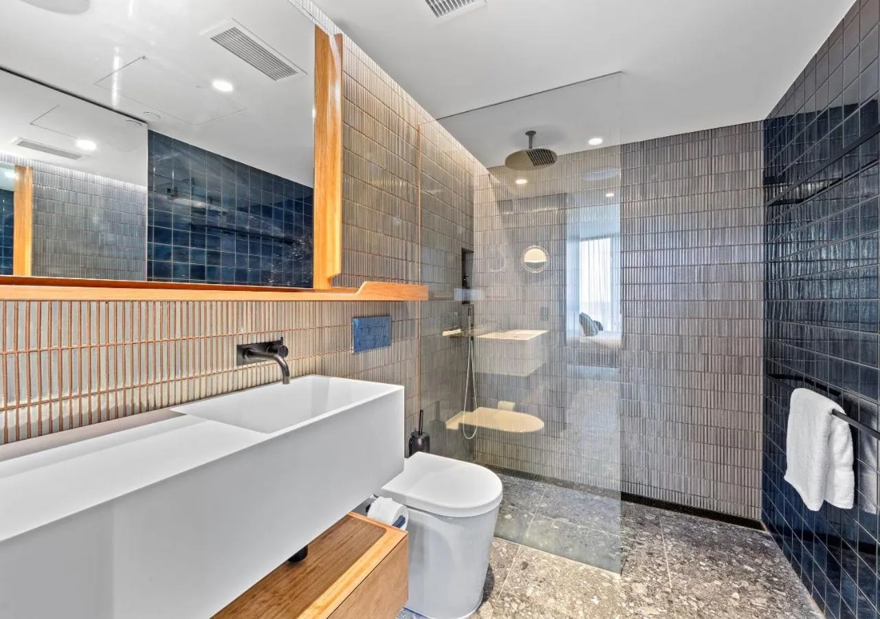 Bathroom in Spire Residences by CLLIX