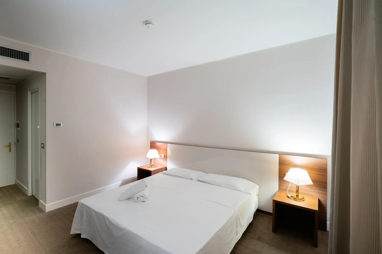 Bed in Capo Peloro Hotel