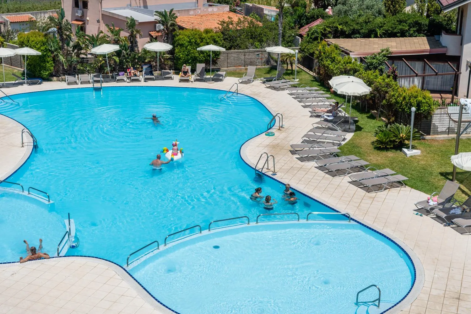 Swimming pool in Capo Peloro Hotel