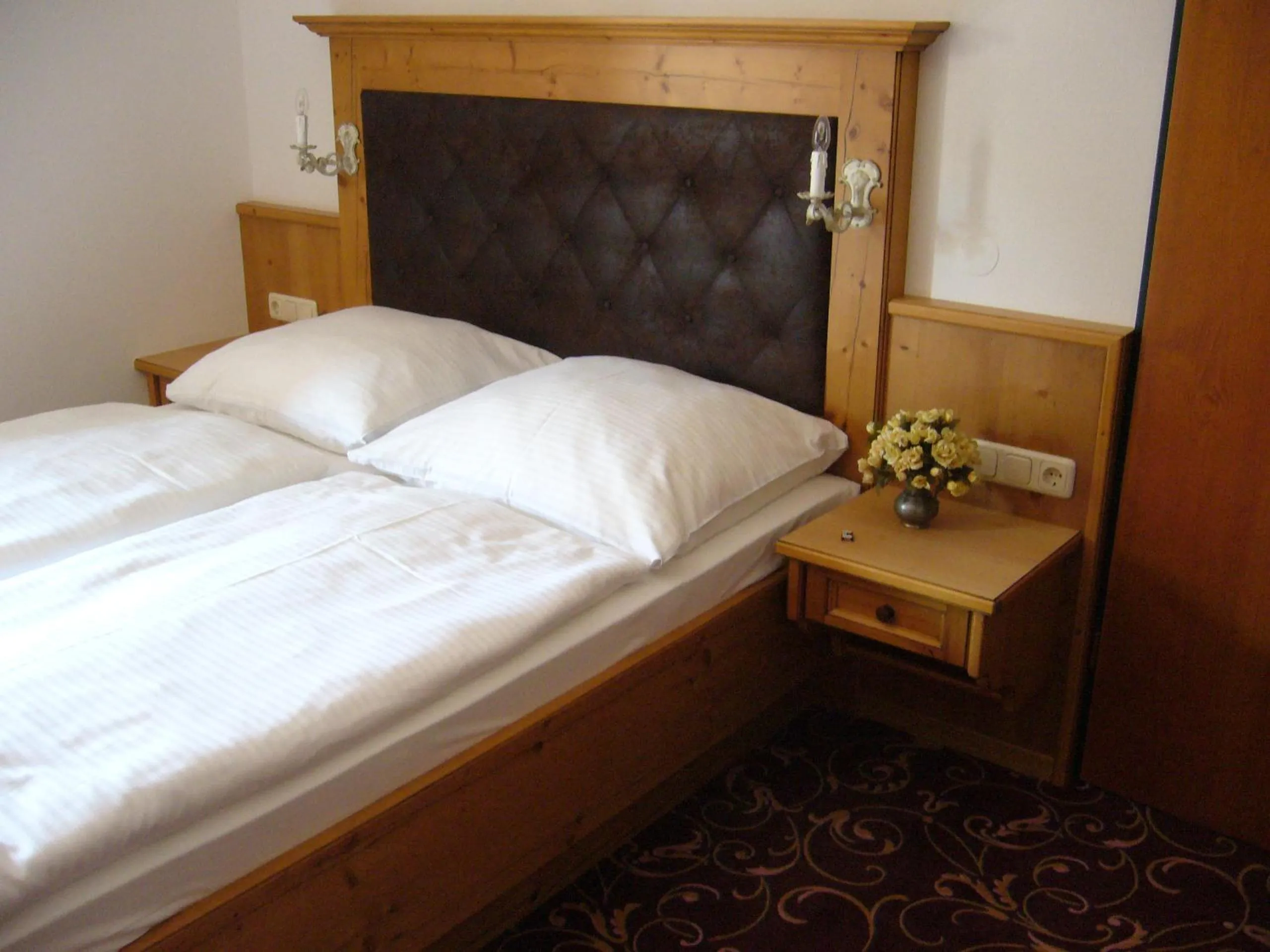 Bed in Alpenhotel Pfaffenwinkel