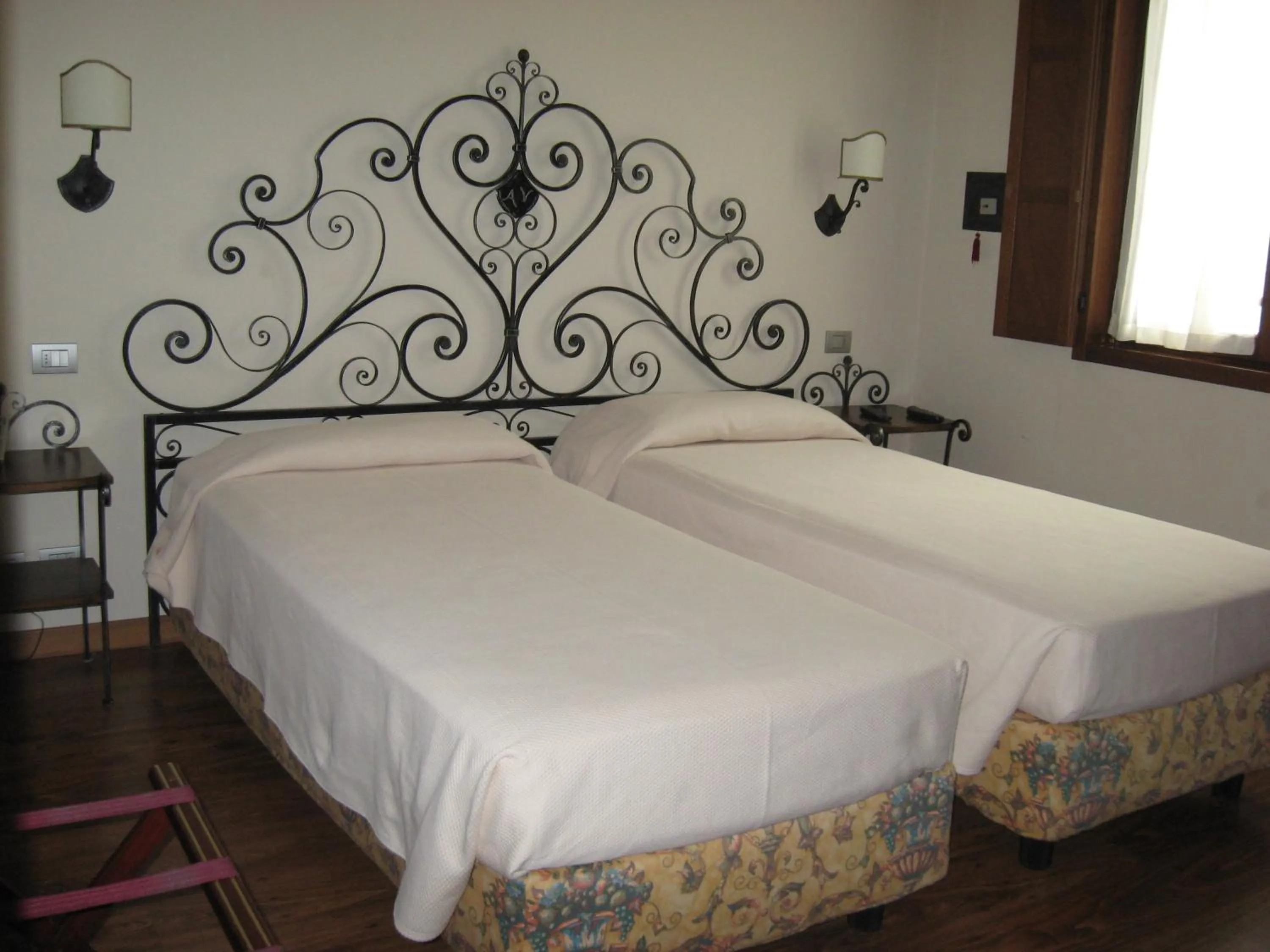 Bed in Albergo Venturelli
