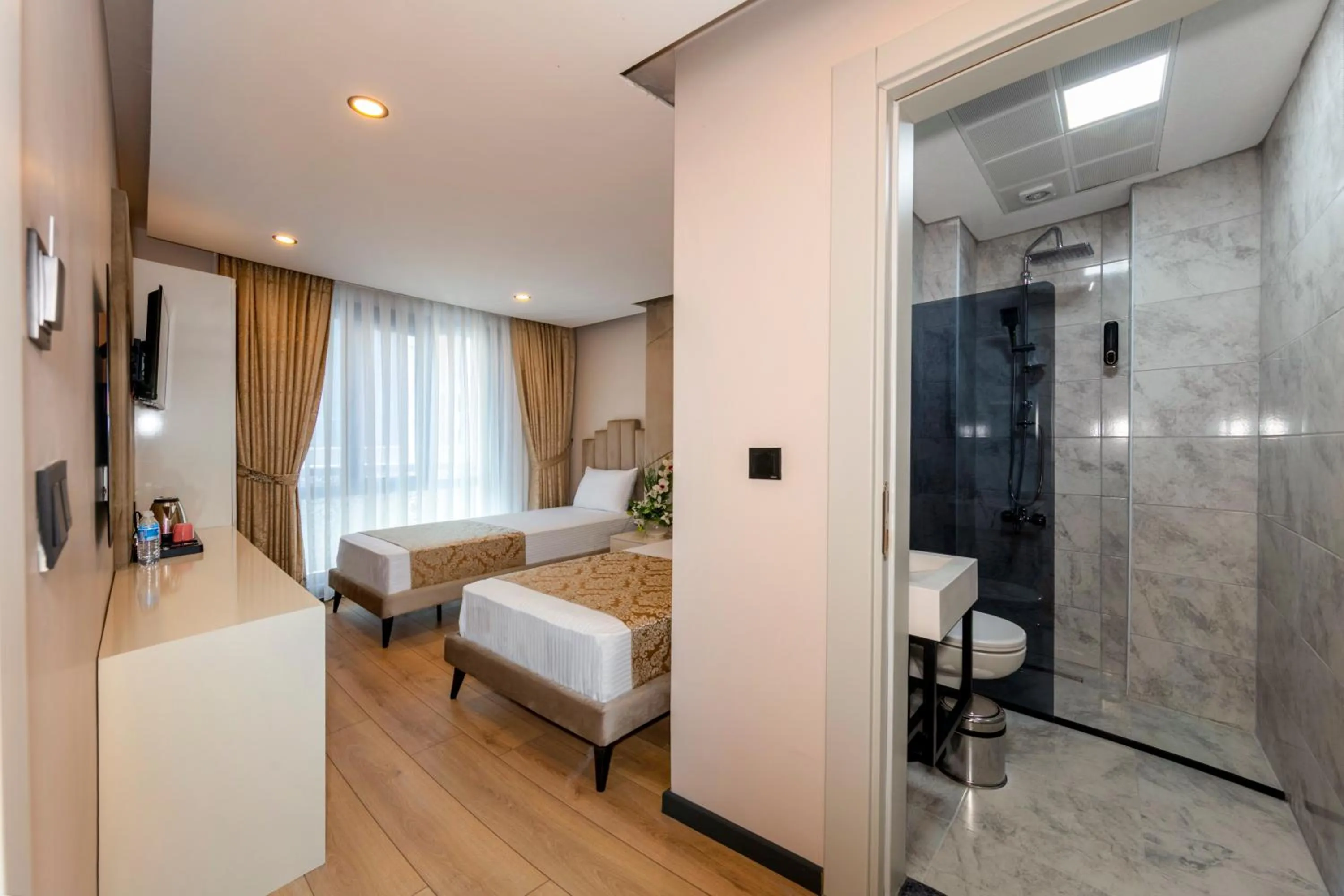 Photo of the whole room, Bed in HillTown Airport Hotel & Restaurant