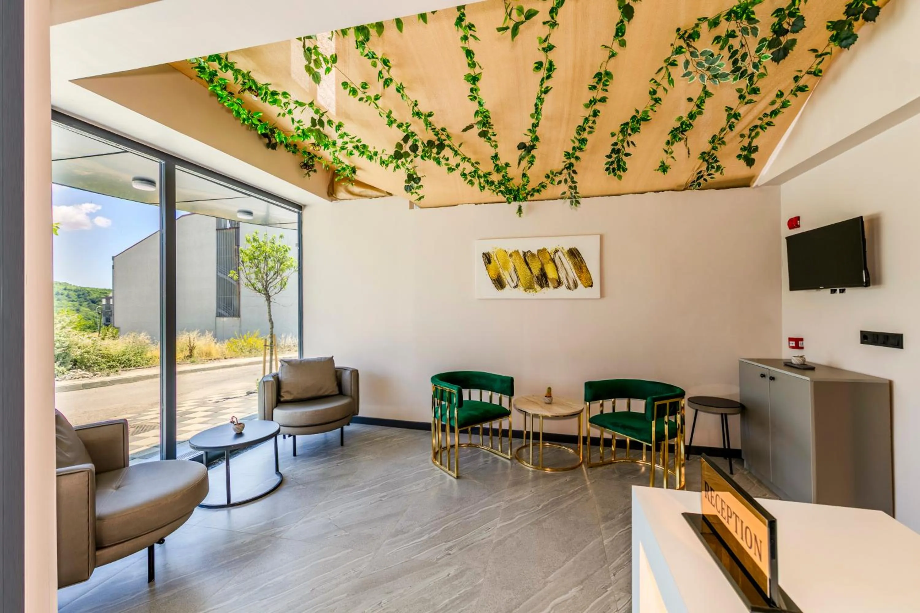 Lobby or reception in HillTown Airport Hotel & Restaurant