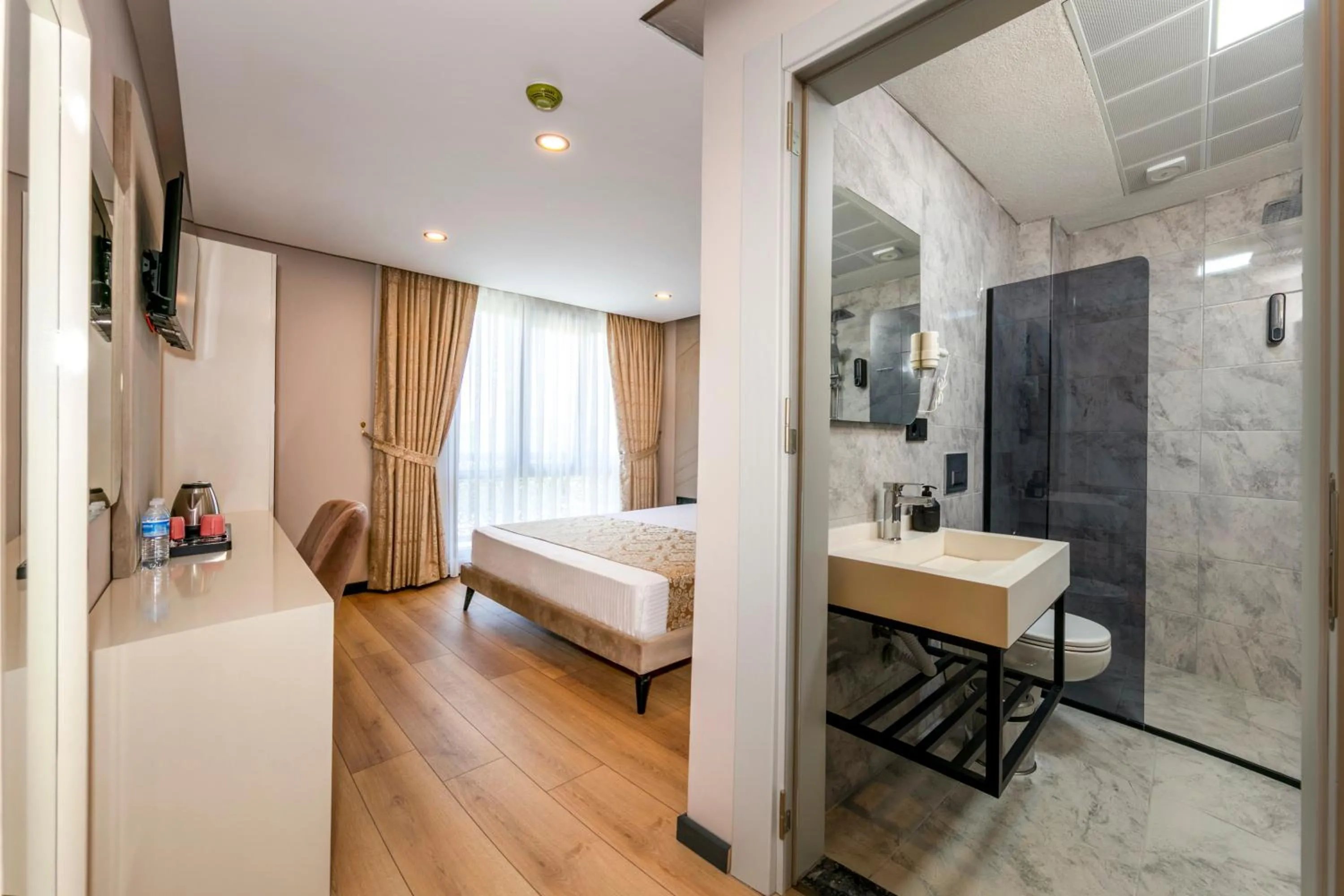 Photo of the whole room, Bed in HillTown Airport Hotel & Restaurant