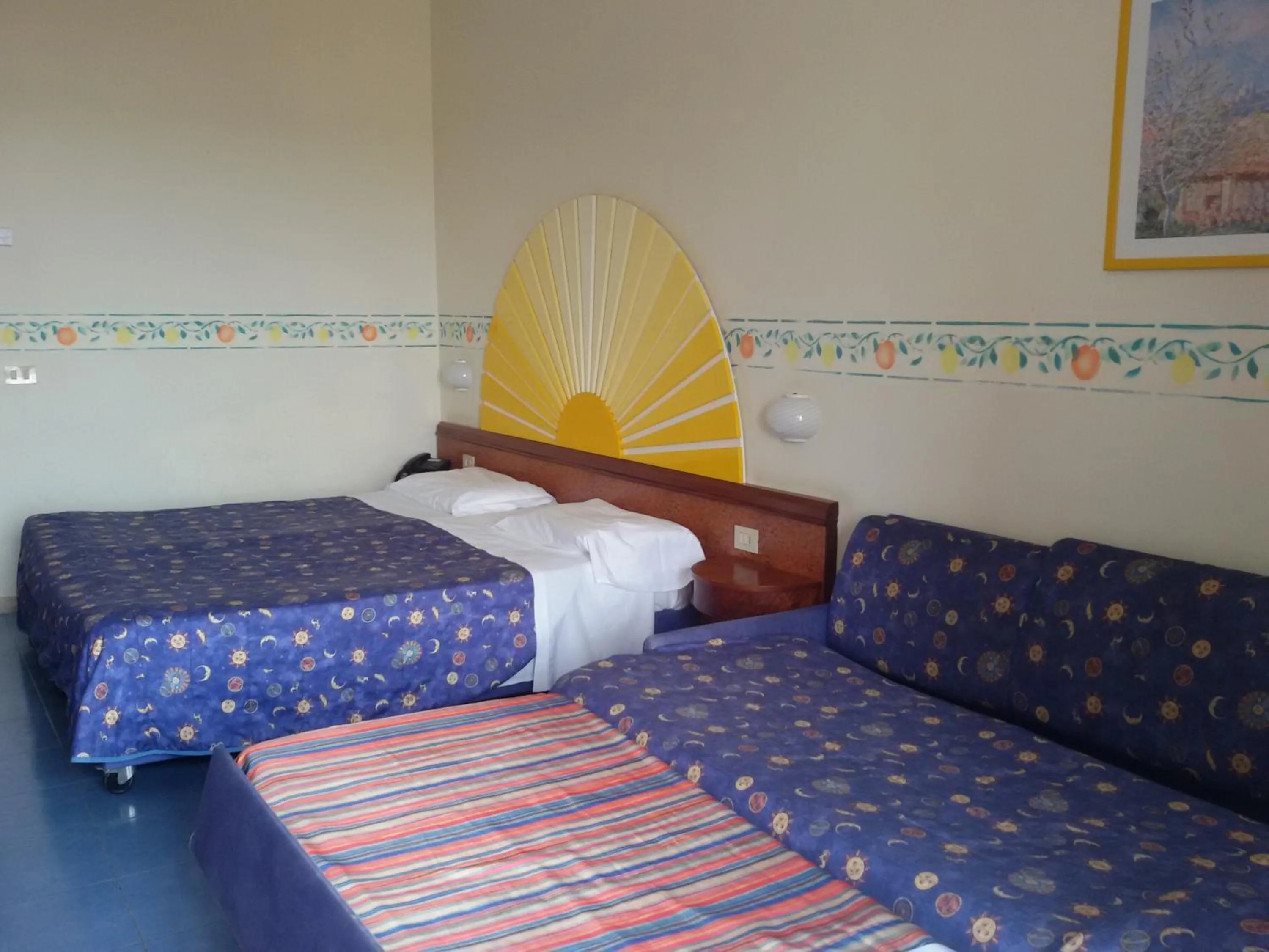 Bed in Sporting Baia Hotel