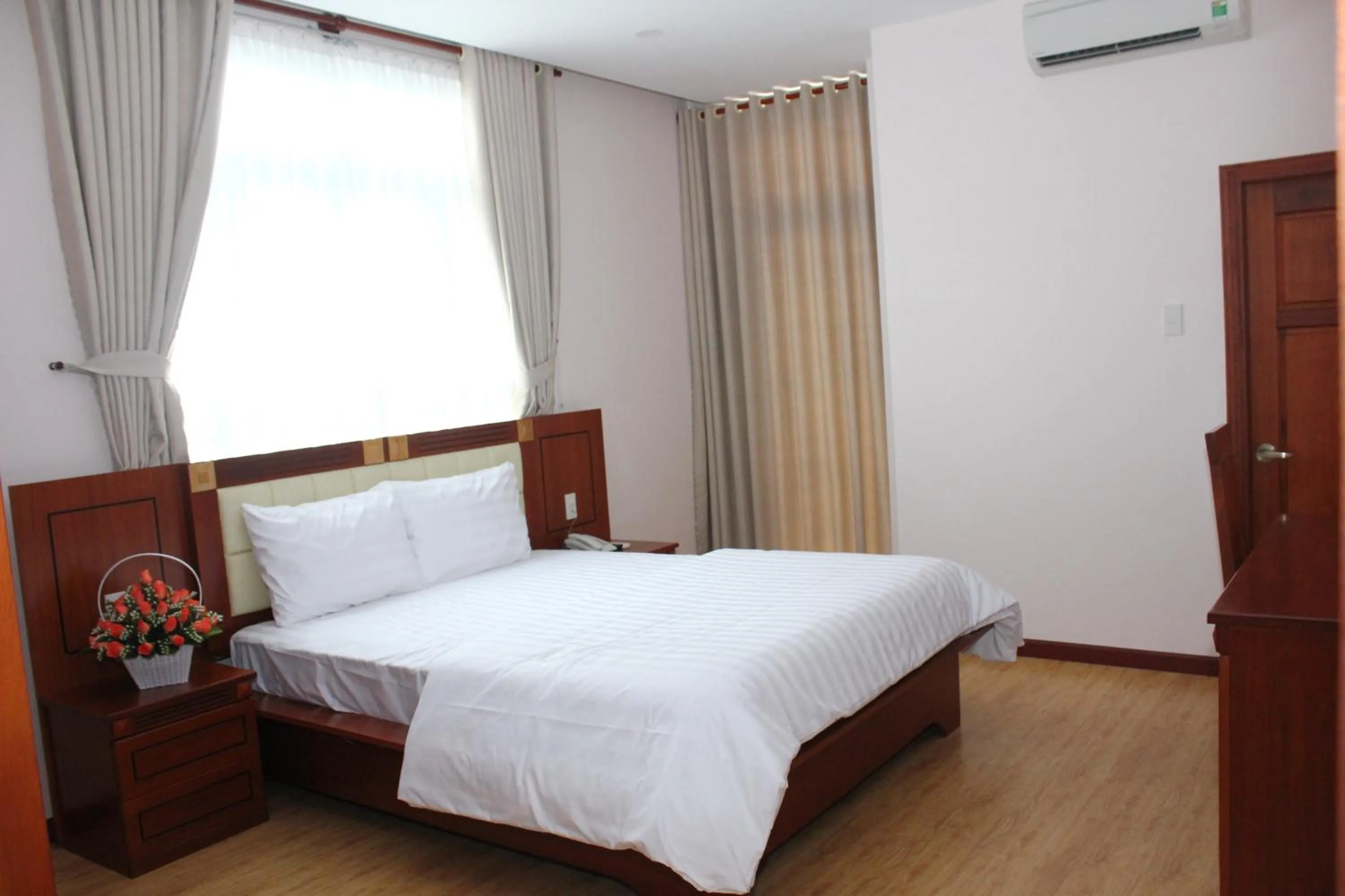 Photo of the whole room, Bed in Hoang Ngoc Hotel