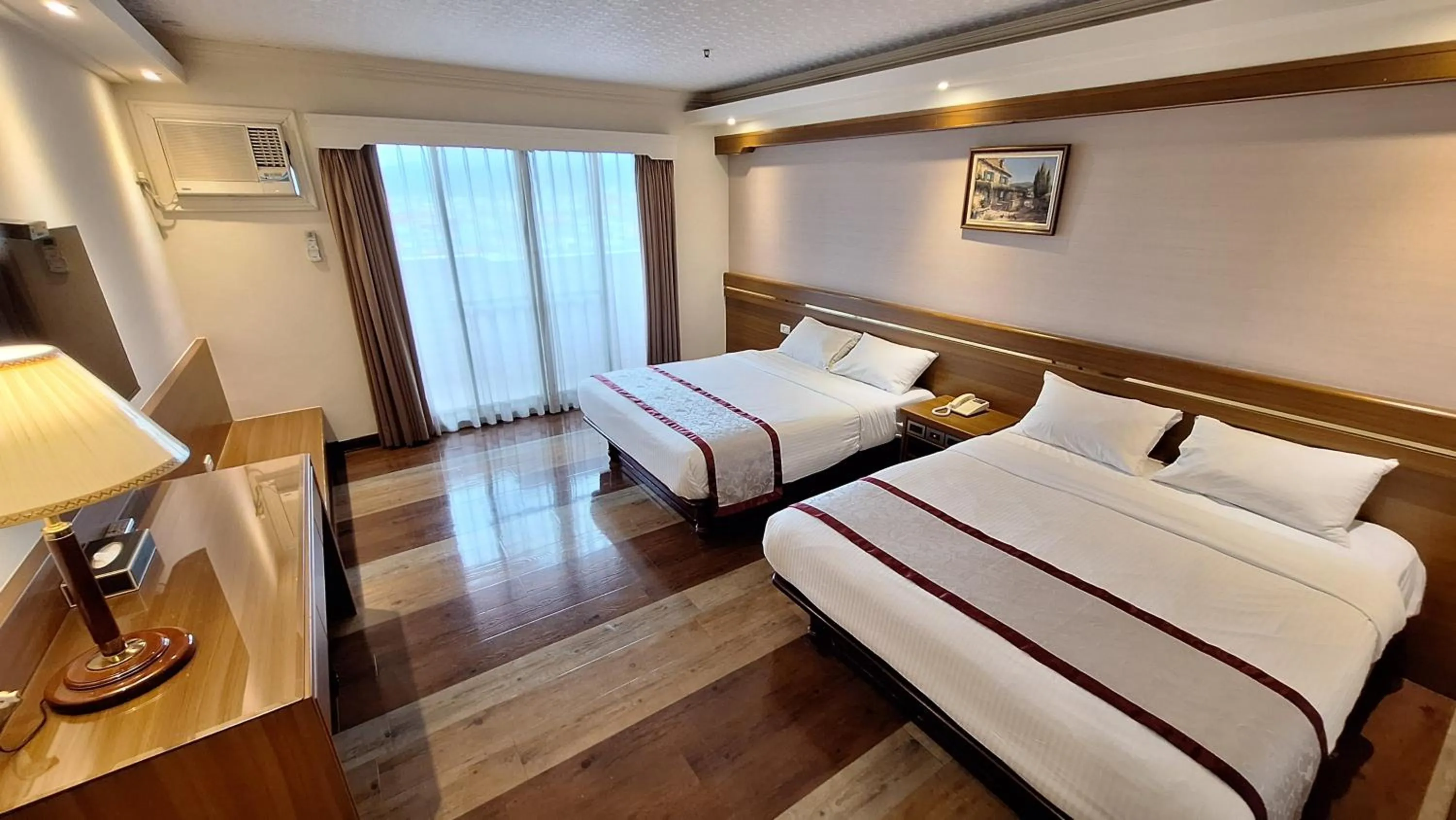 Bed in Cheng Pao Hotel