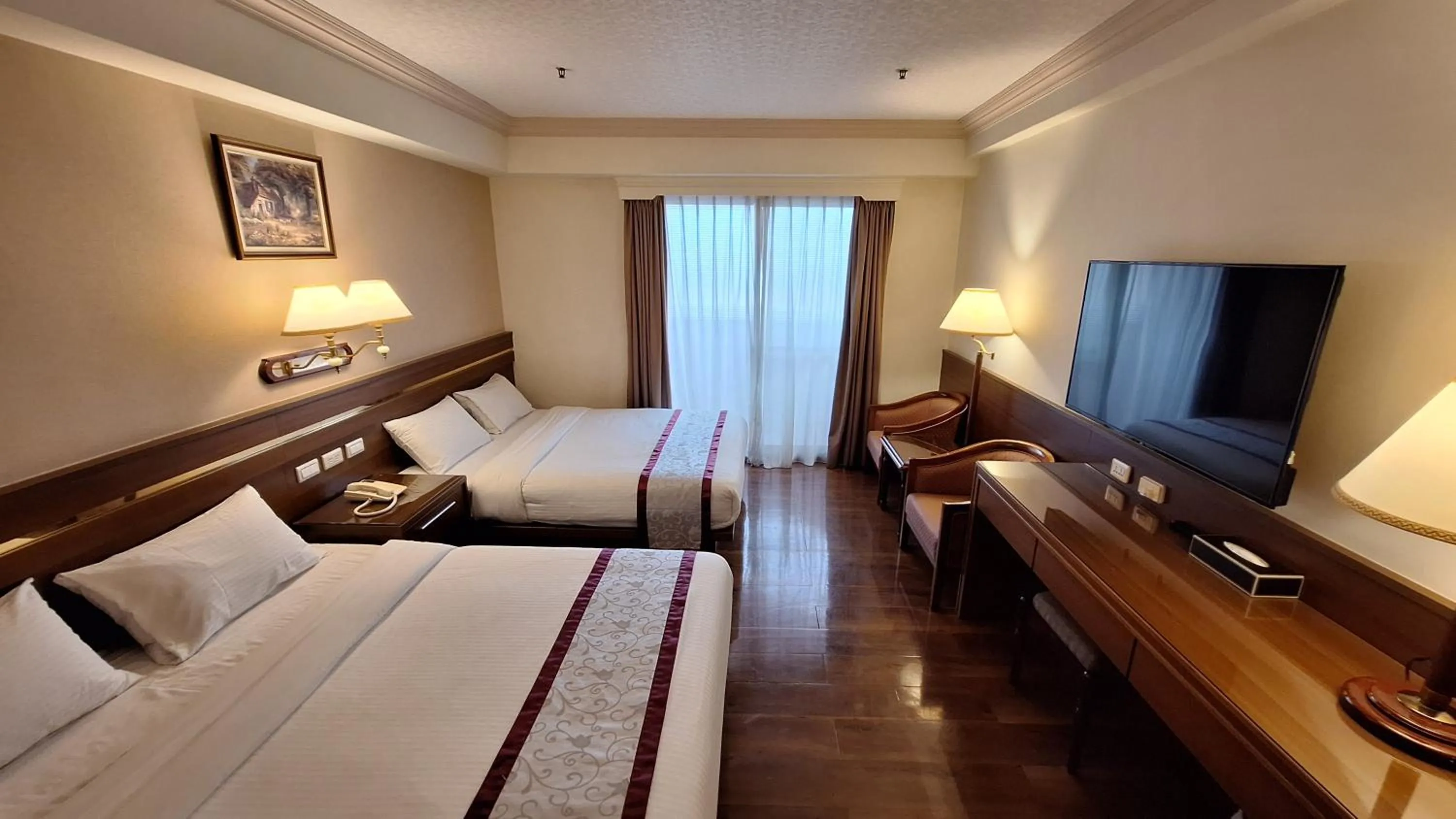 Bed in Cheng Pao Hotel