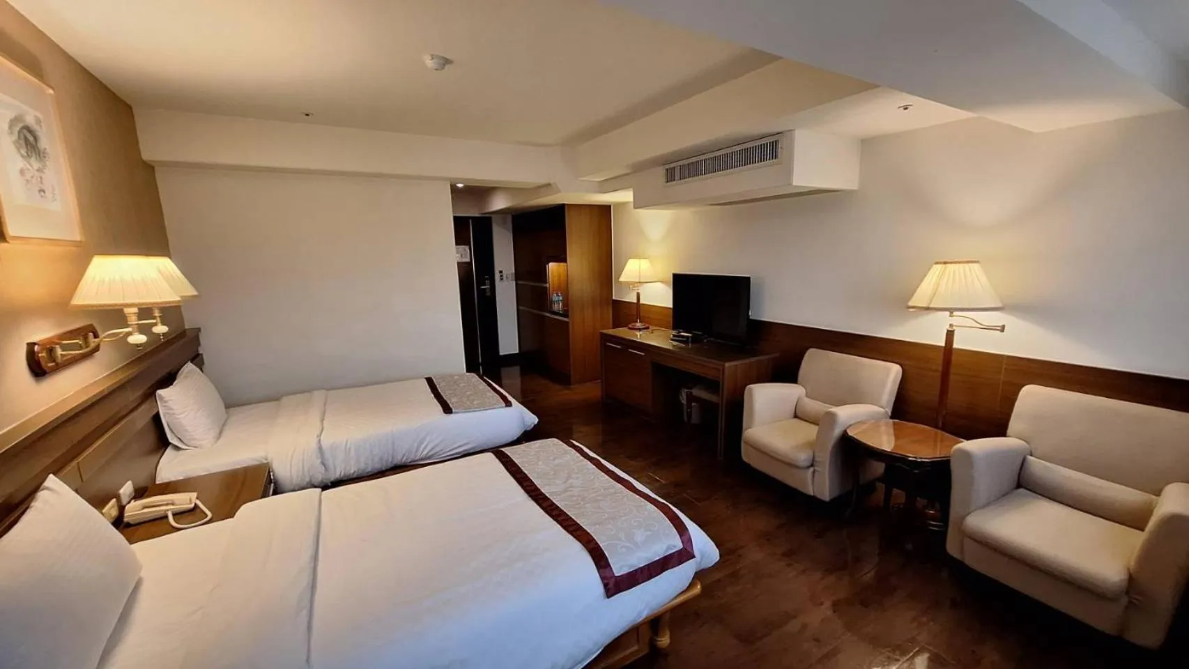 Bed in Cheng Pao Hotel