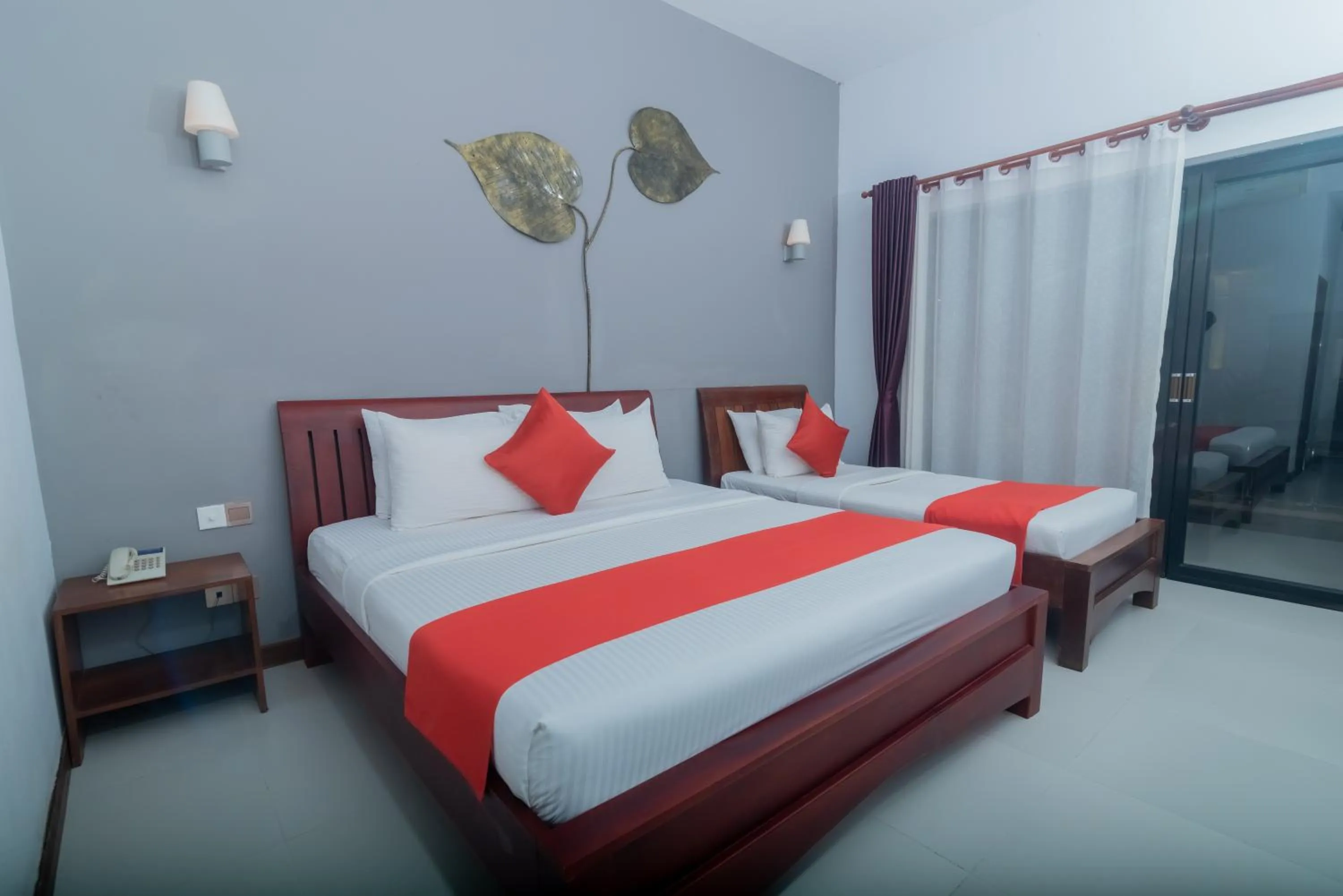 Bed in New Riverside Hotel