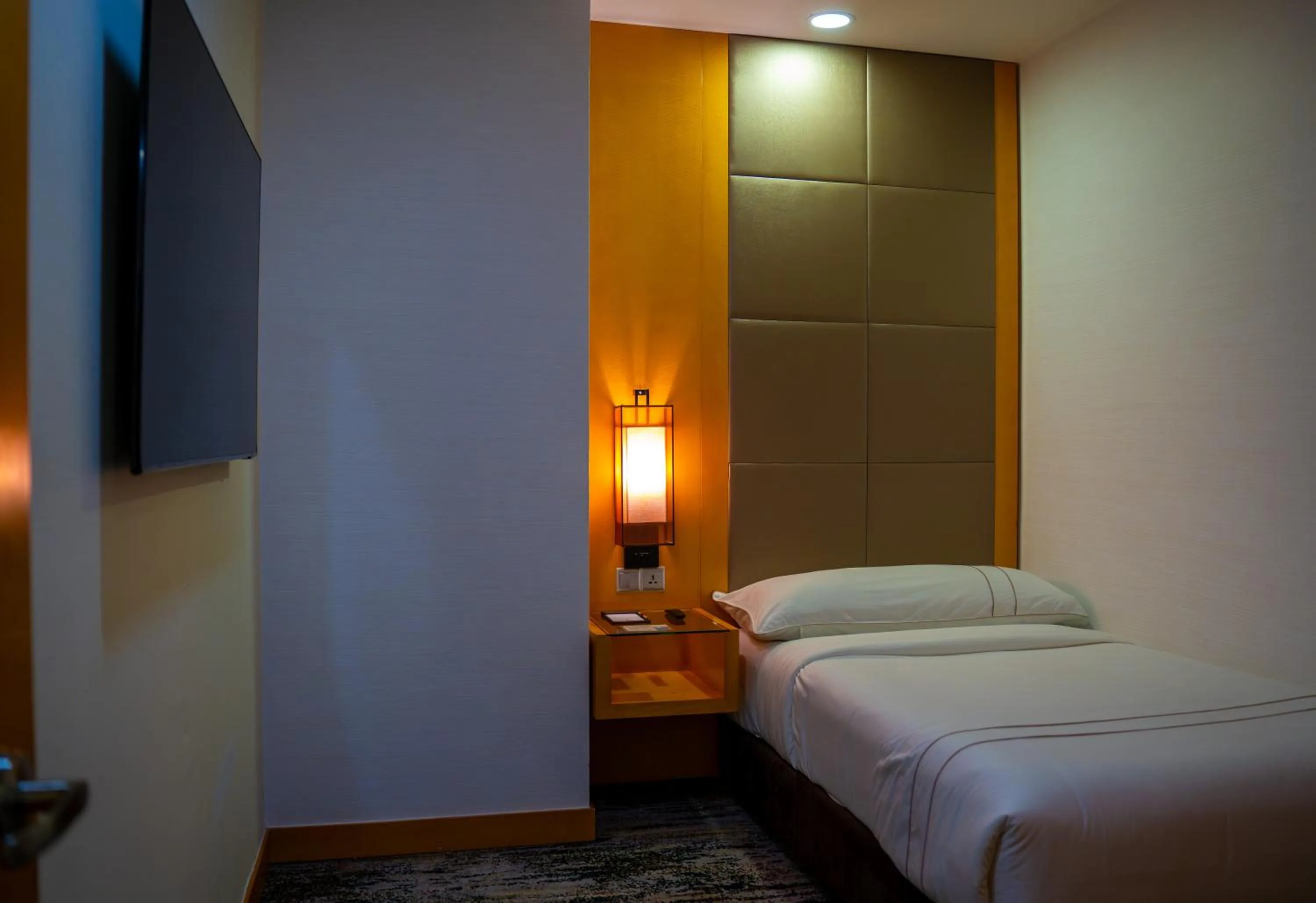 Bed in The Waterfront Hotel Kuching