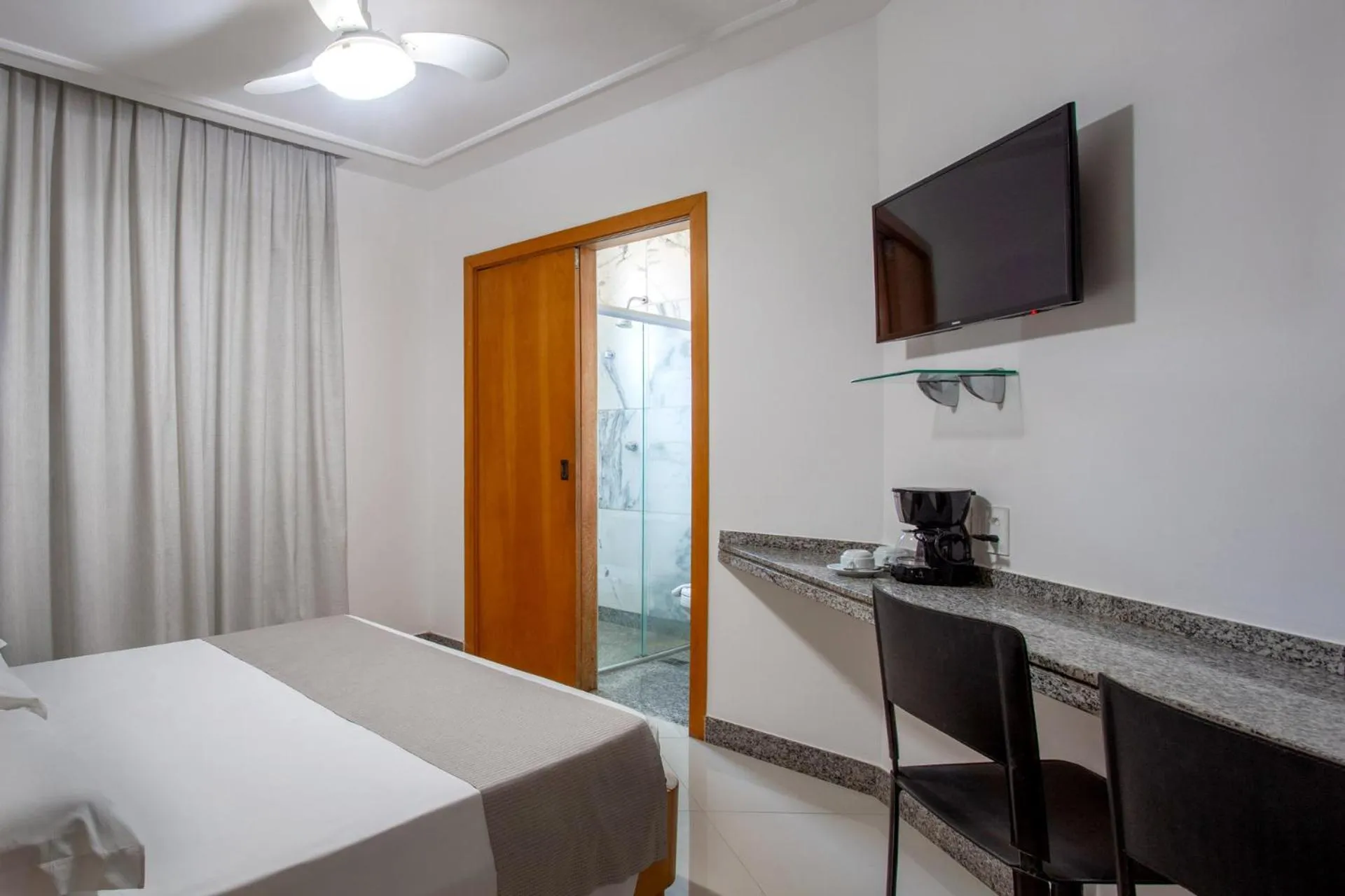 TV and multimedia, Bed in Savassinho Hotel & Residence