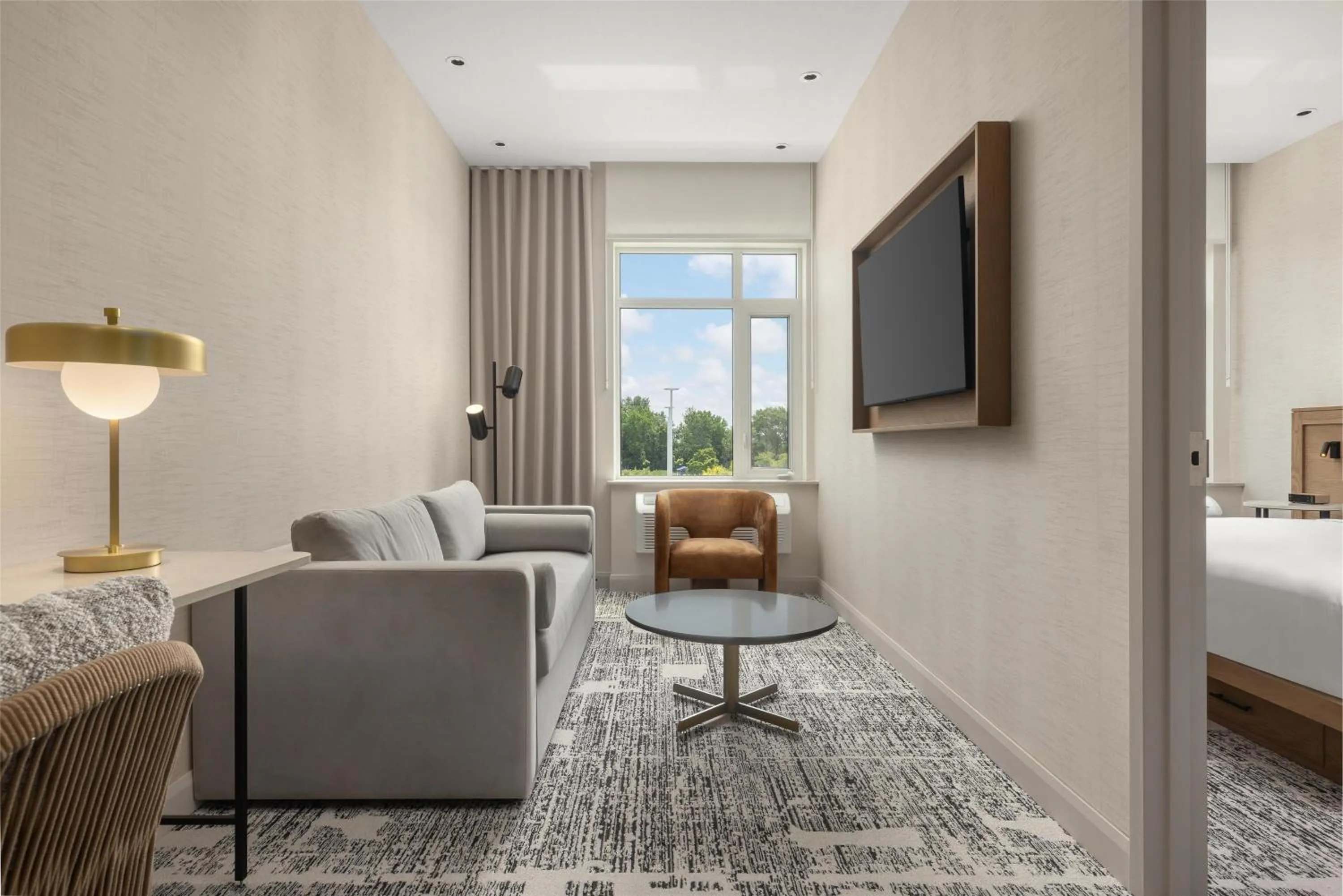 Living room, Bed in Hotel Railwayparc Montreal, Tapestry Collection By Hilton