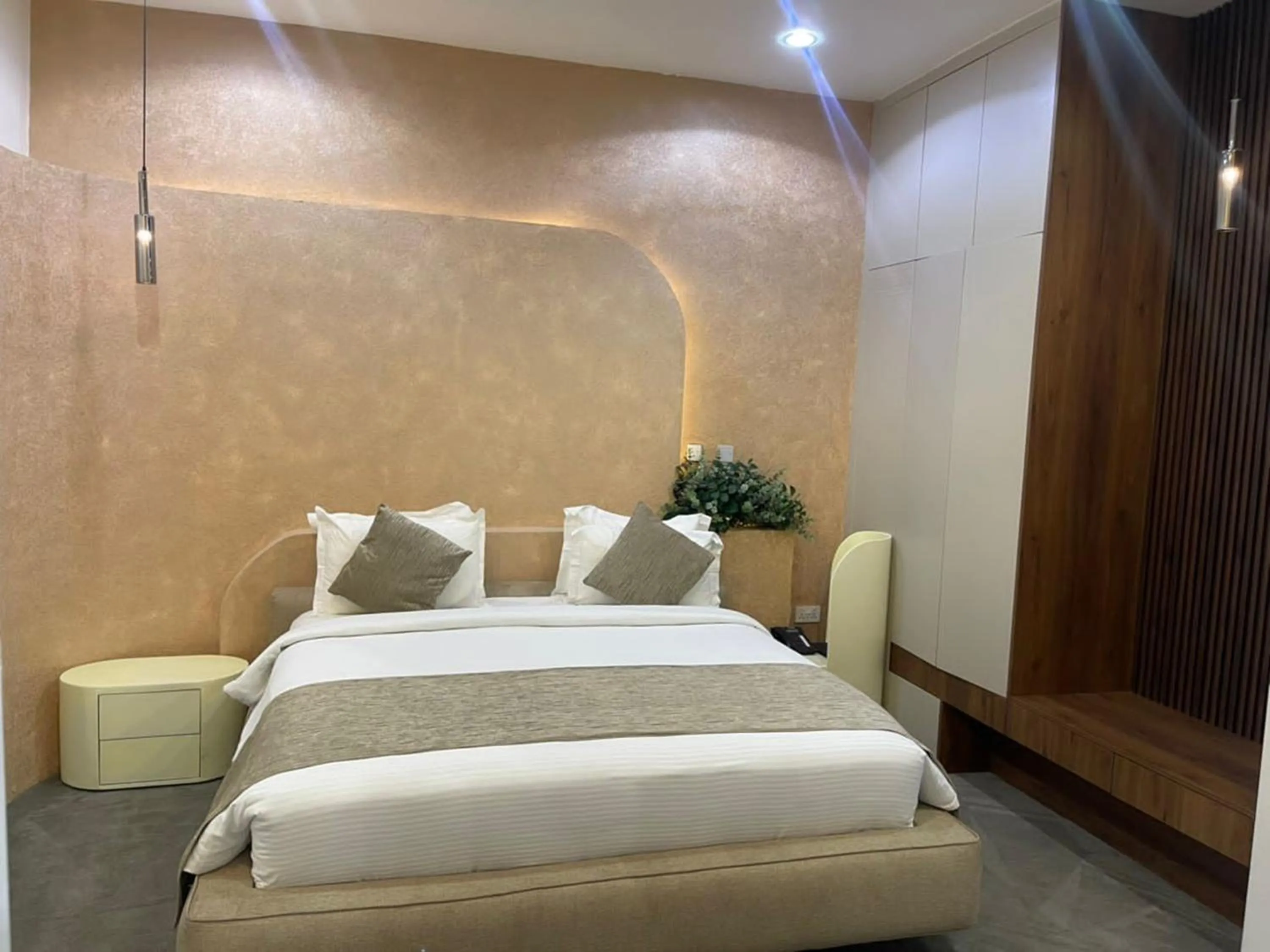 Bed in UrbanEdge Hotel