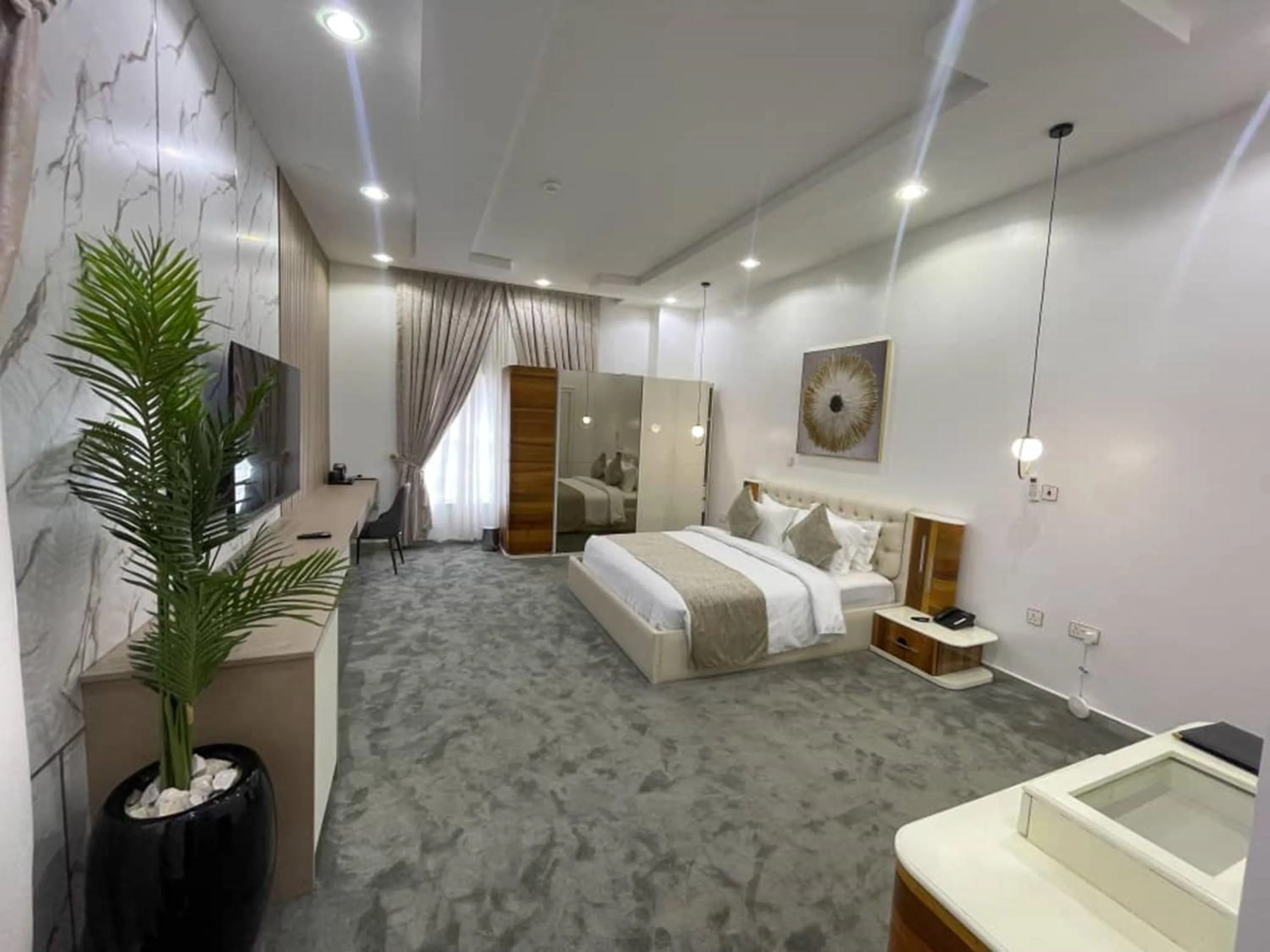 Bed in UrbanEdge Hotel