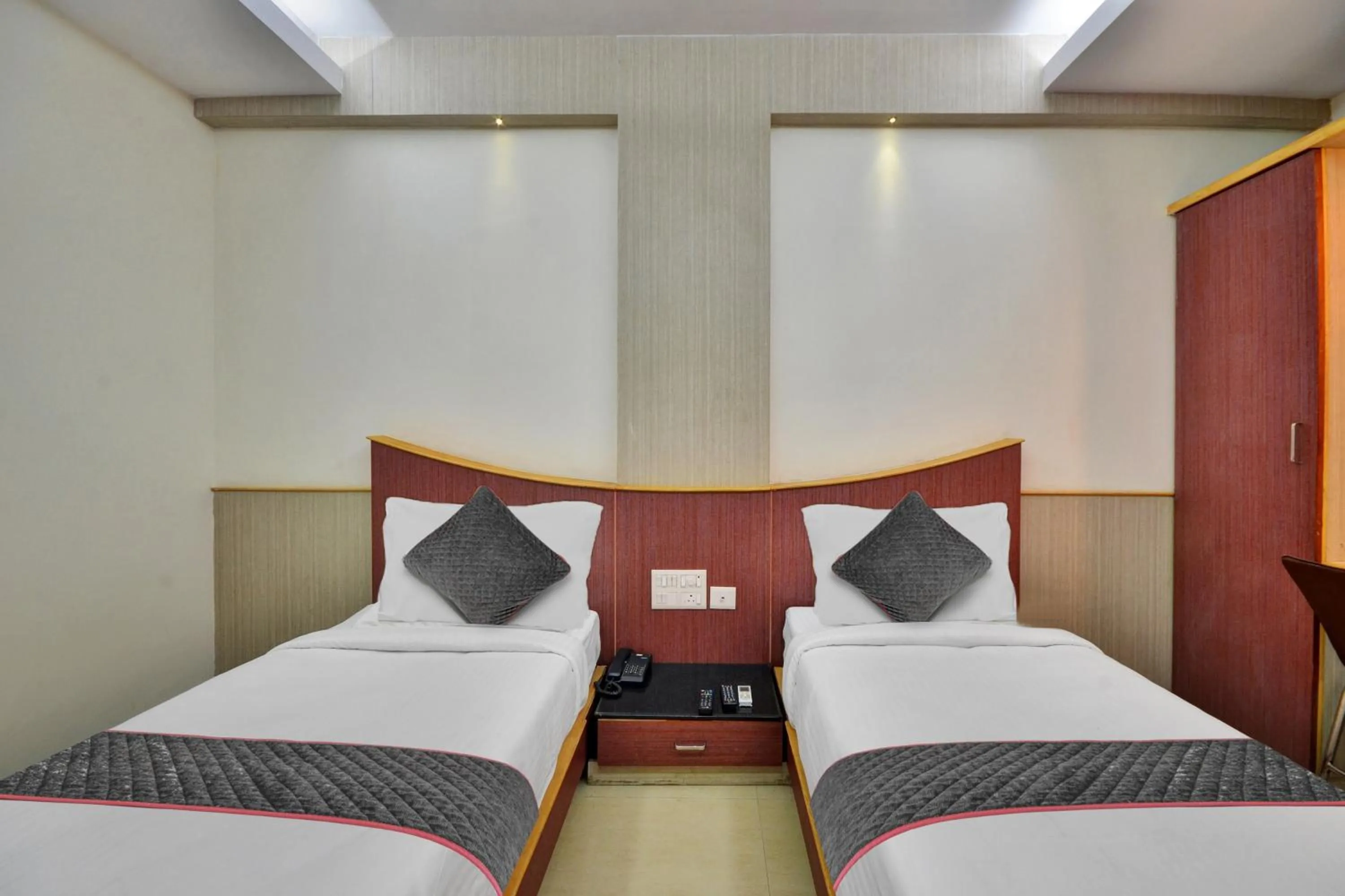 Bedroom, Bed in Townhouse Coastal Grand Hotels and Resorts