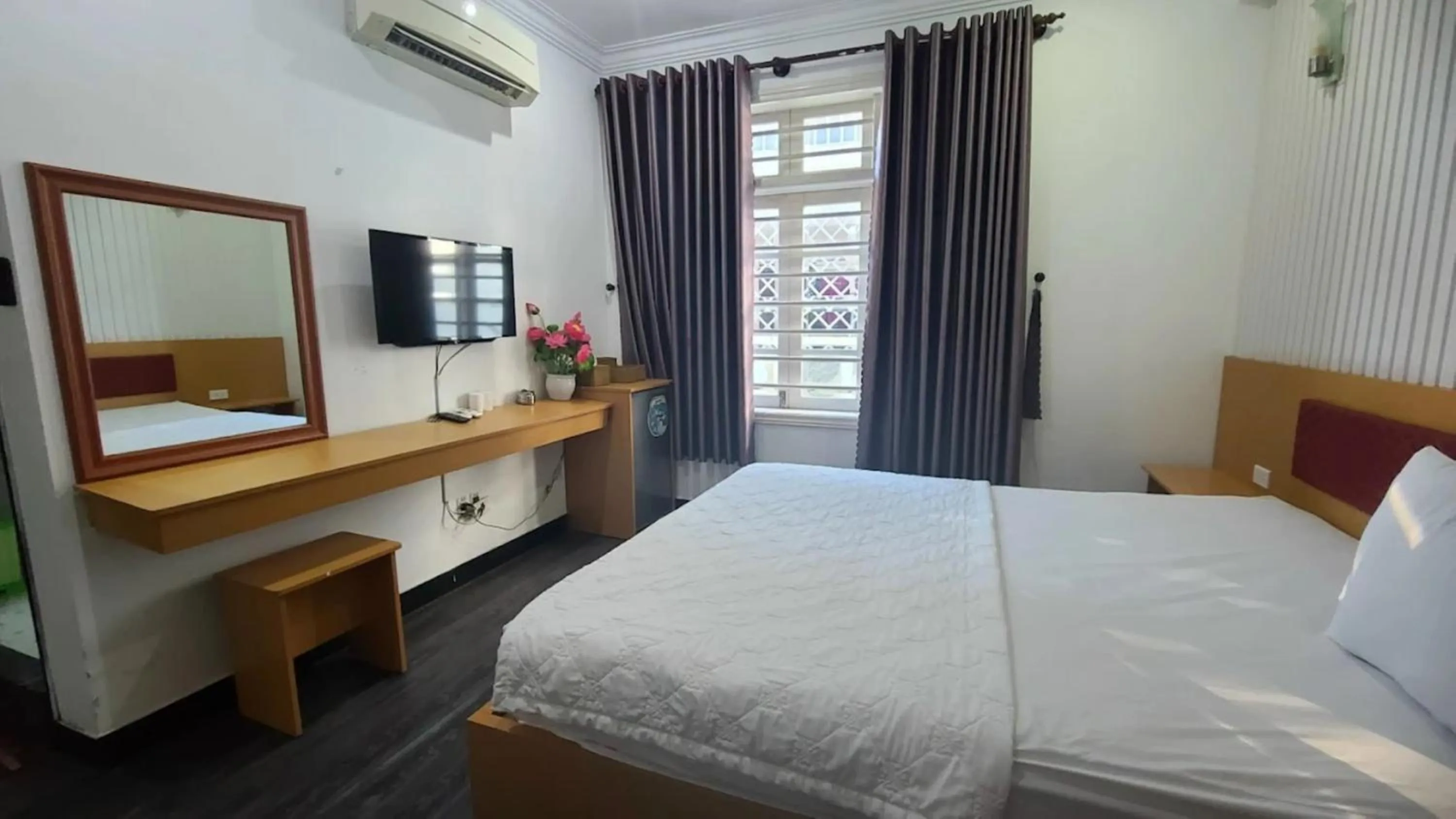 Bed in Minh Hà Hotel Hồ Chí Minh