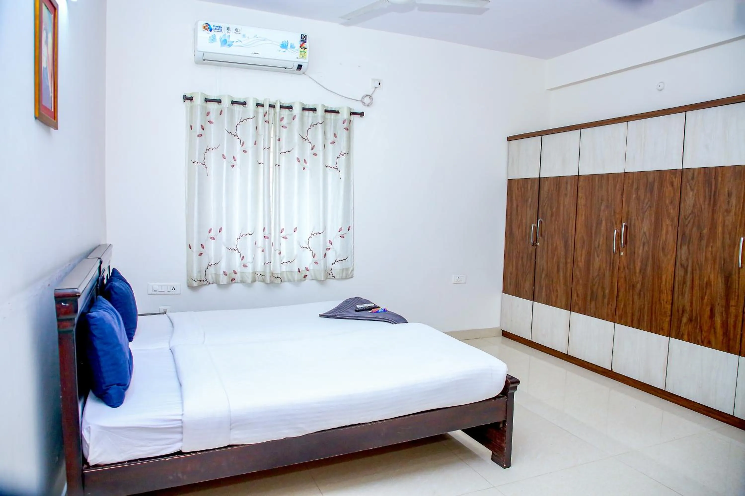 Bed in Sri Ramanjaneya Nilayam