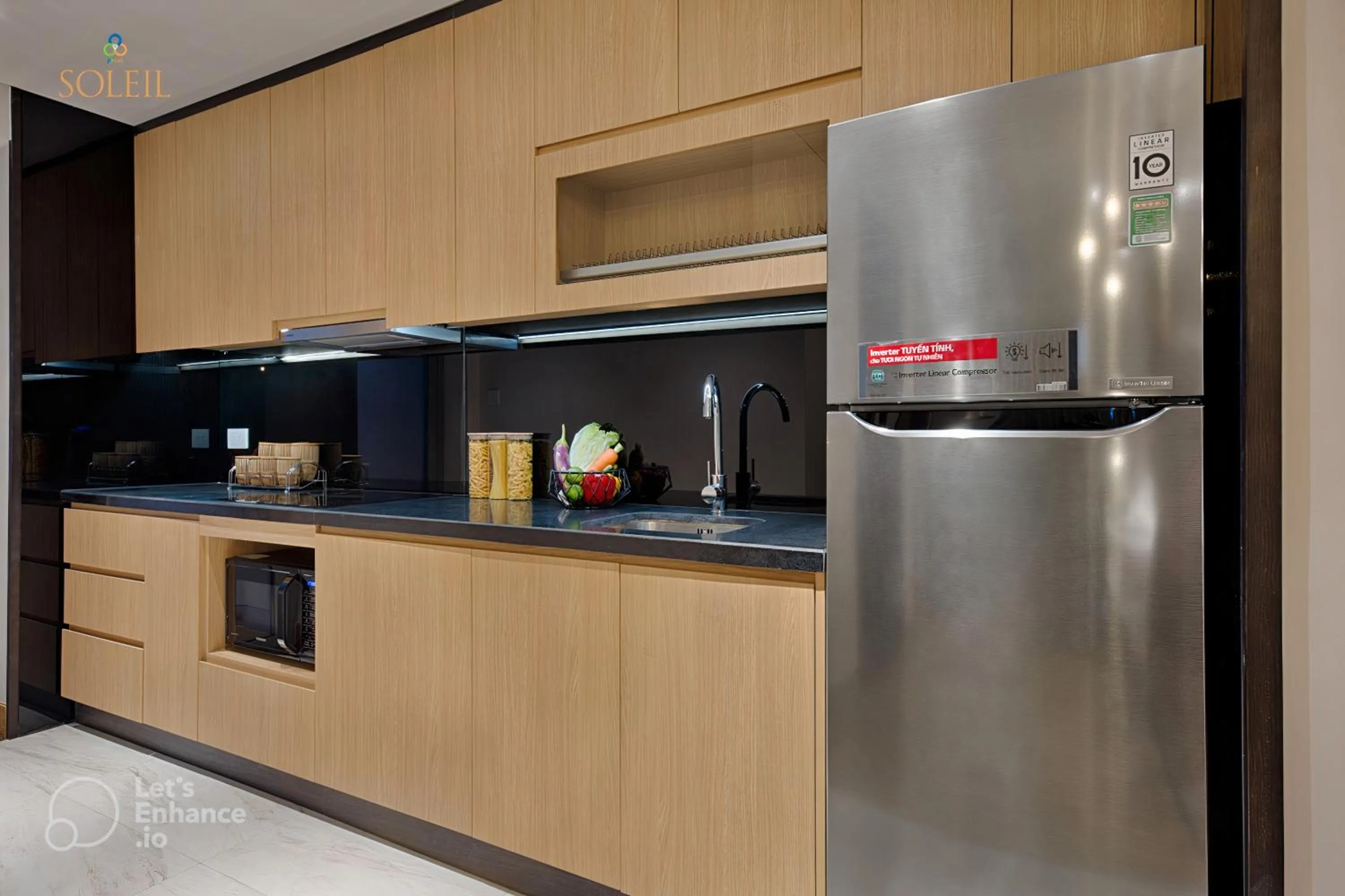 kitchen in Wyndham Soleil Danang - Free Two ways Airport Transport