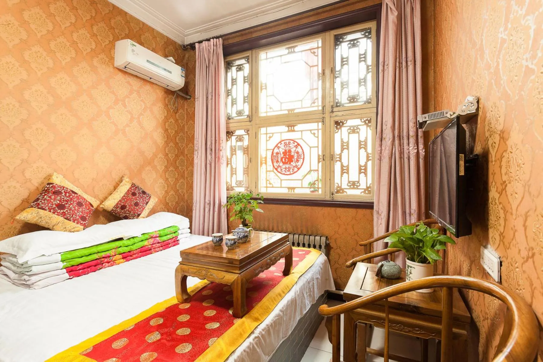 Bed in Pingyao Jiaxin Guesthouse