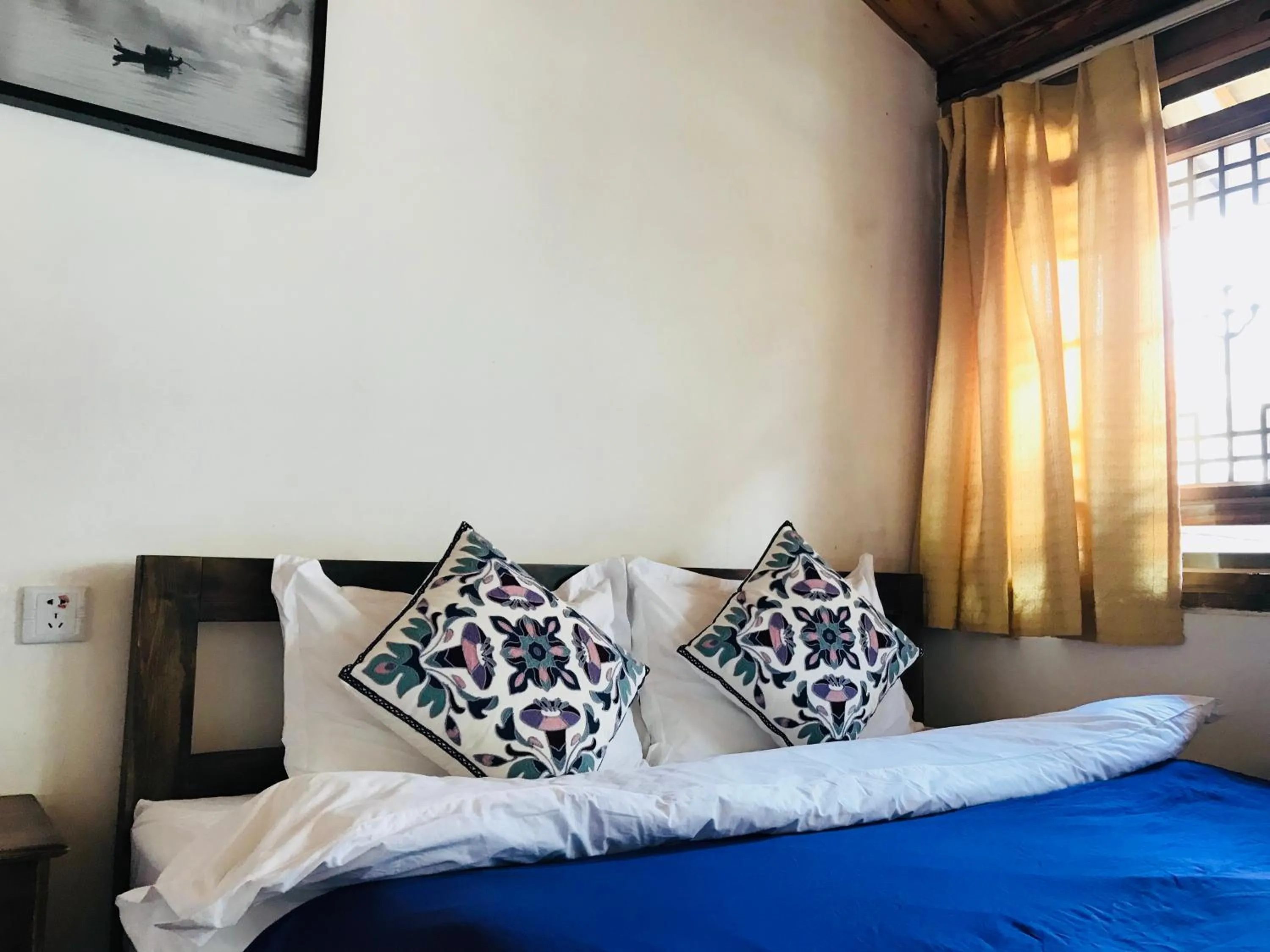 Bed in Tourist Courtyard Hotel