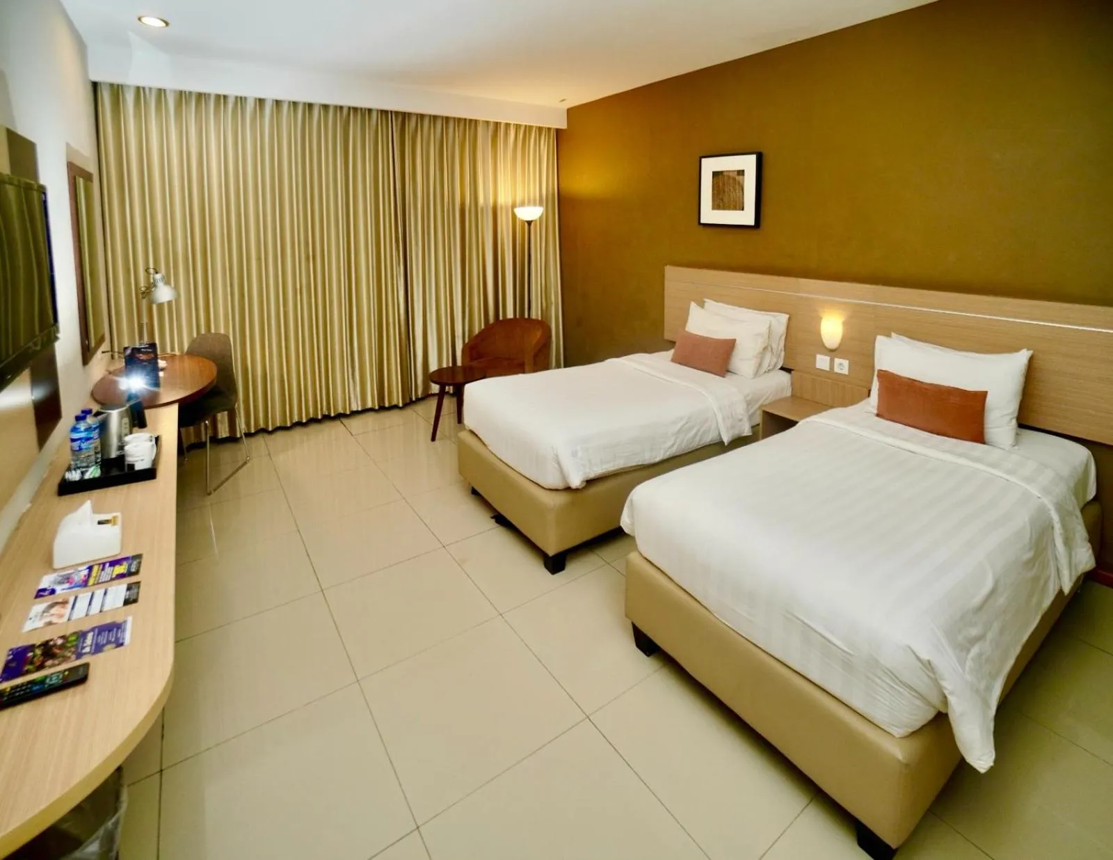 Bed in De Laxston Hotel Yogyakarta, Azana Hotels Collection
