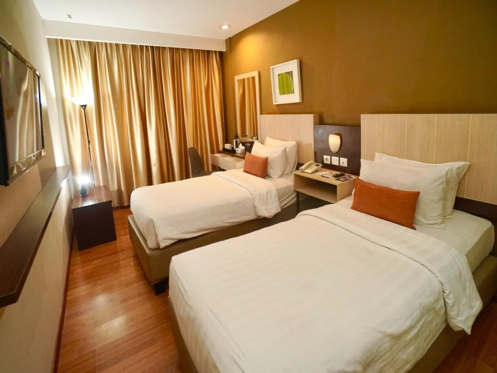 Bed in De Laxston Hotel Yogyakarta, Azana Hotels Collection