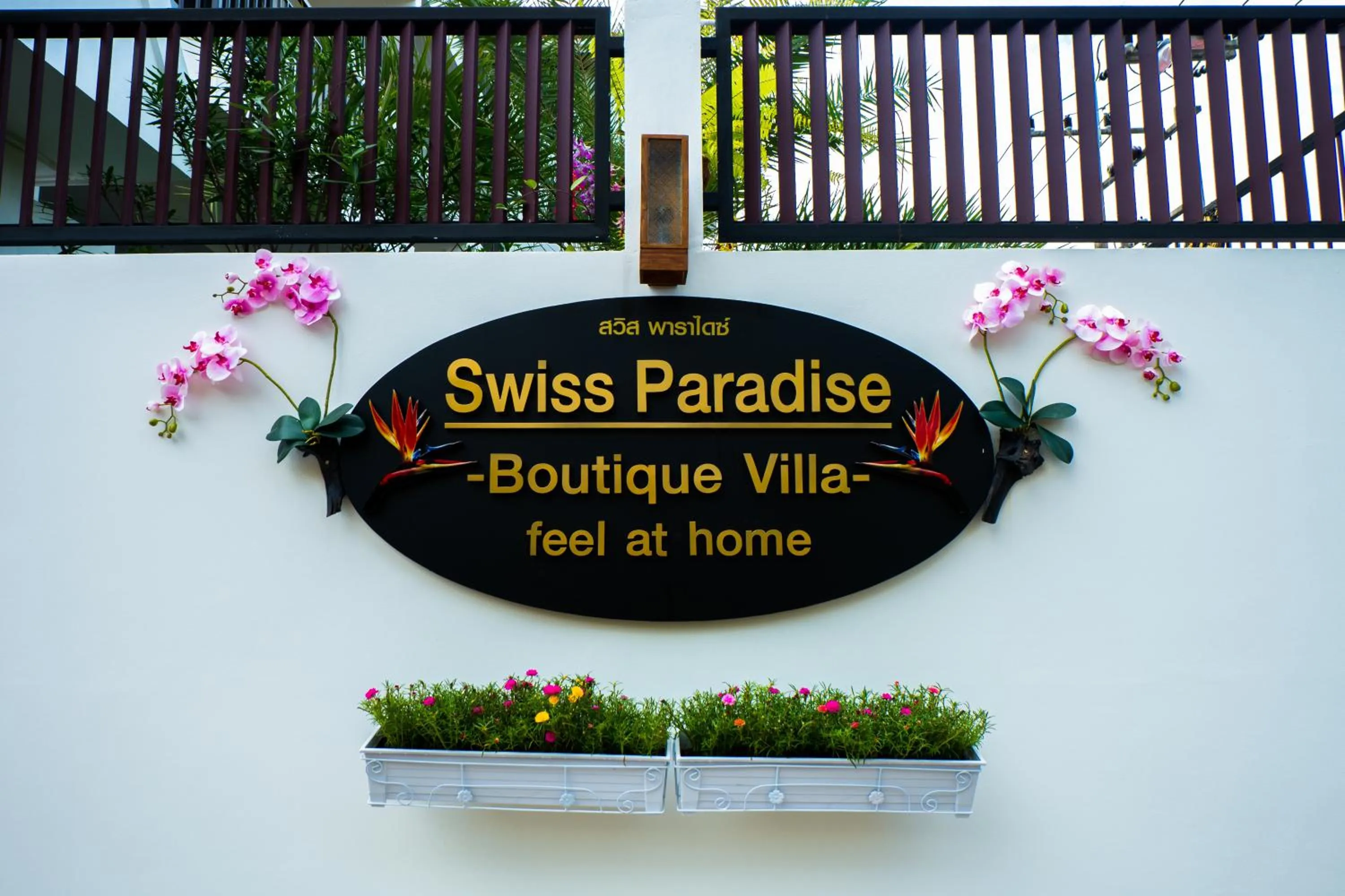 Property logo or sign in Swiss Paradise Boutique Villa