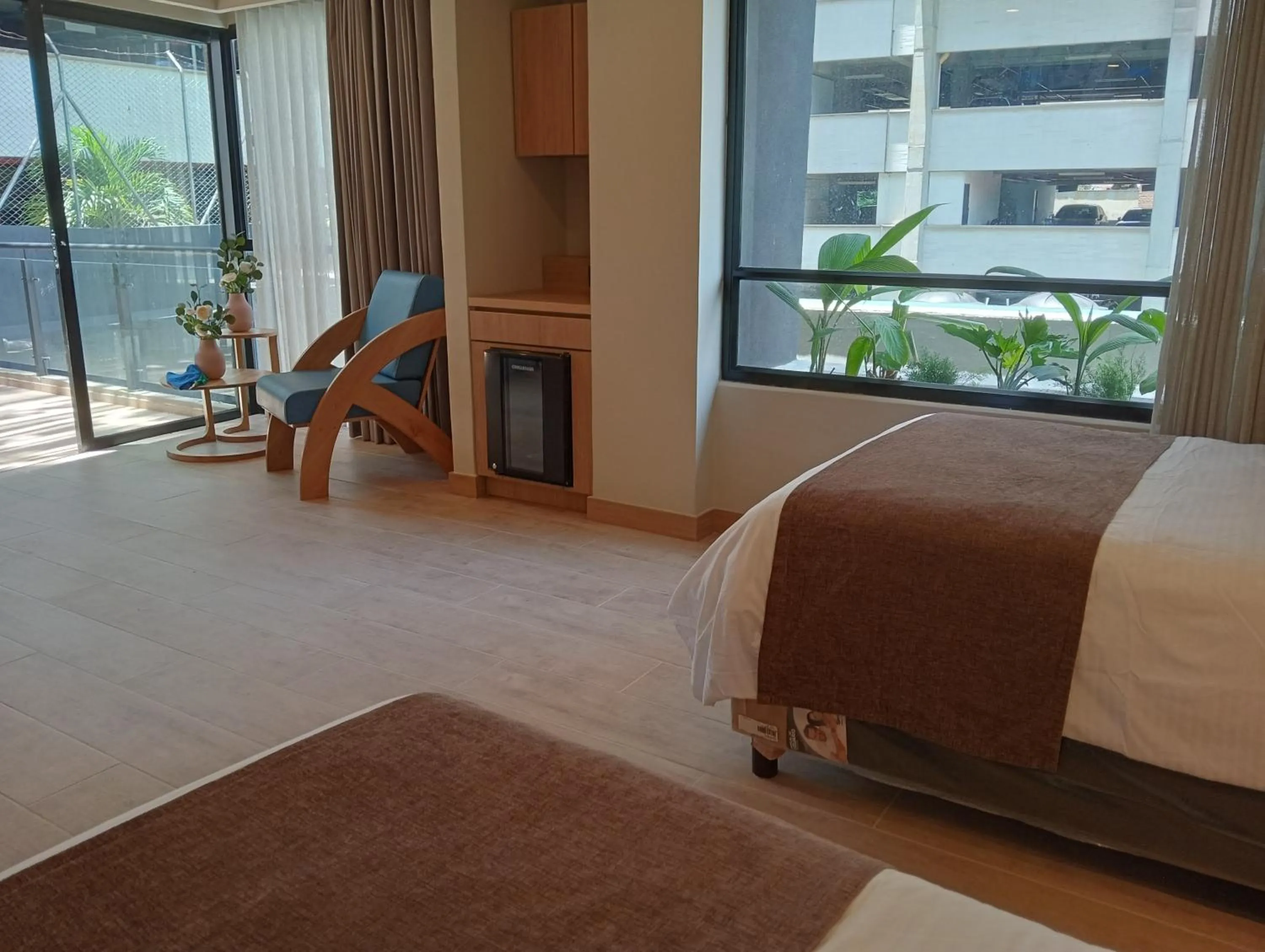 View (from property/room), Bed in Hotel Rulay Medellin