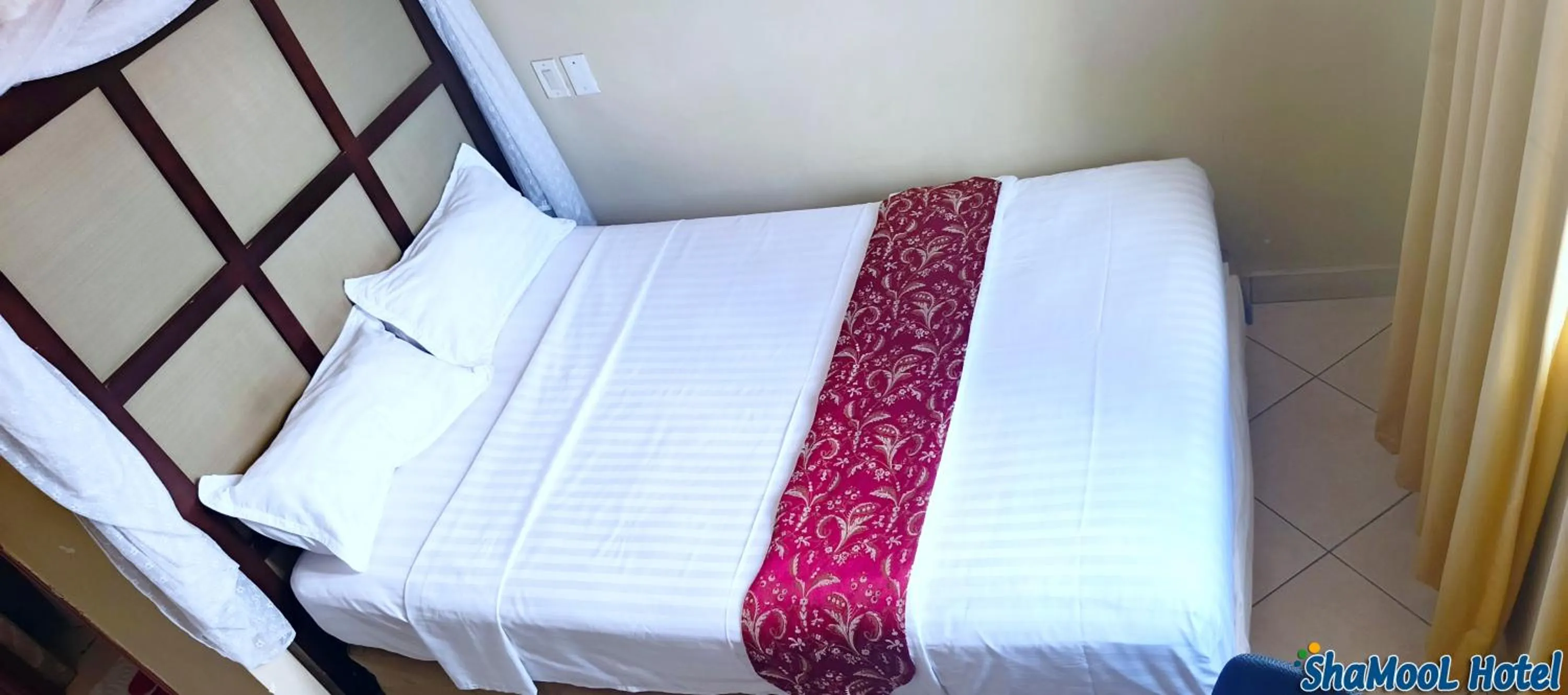 Bed in ShaMooL Hotel