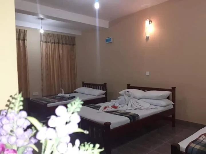 Bed in Anura Guest Inn