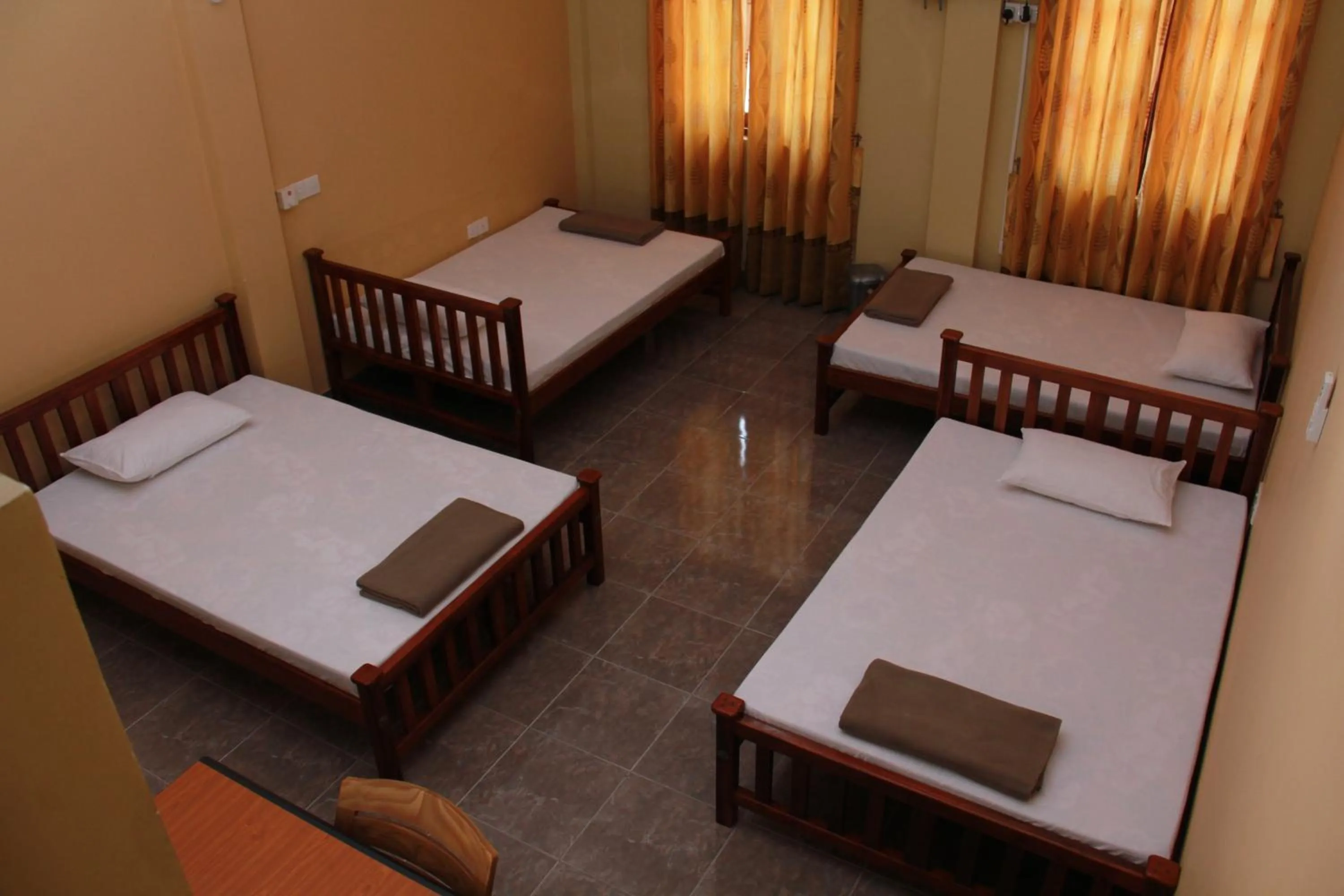 Photo of the whole room, Bed in Anura Guest Inn