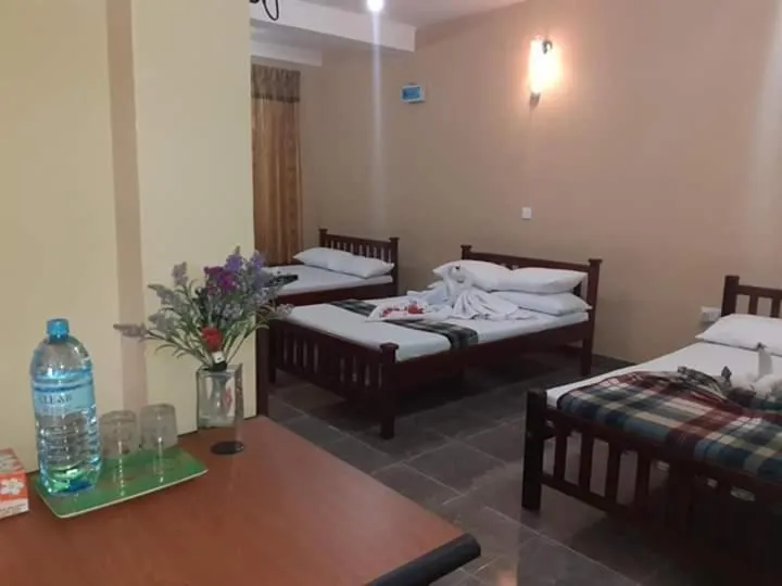 Bed in Anura Guest Inn