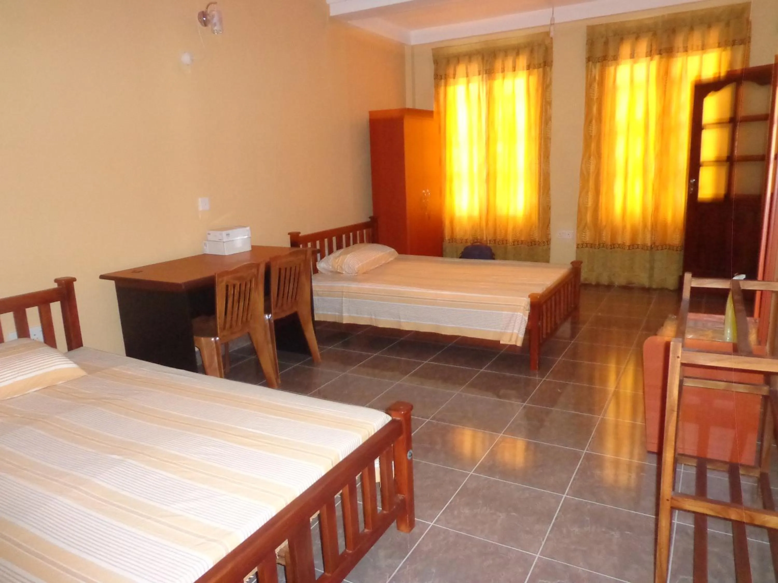 Day, Bed in Anura Guest Inn