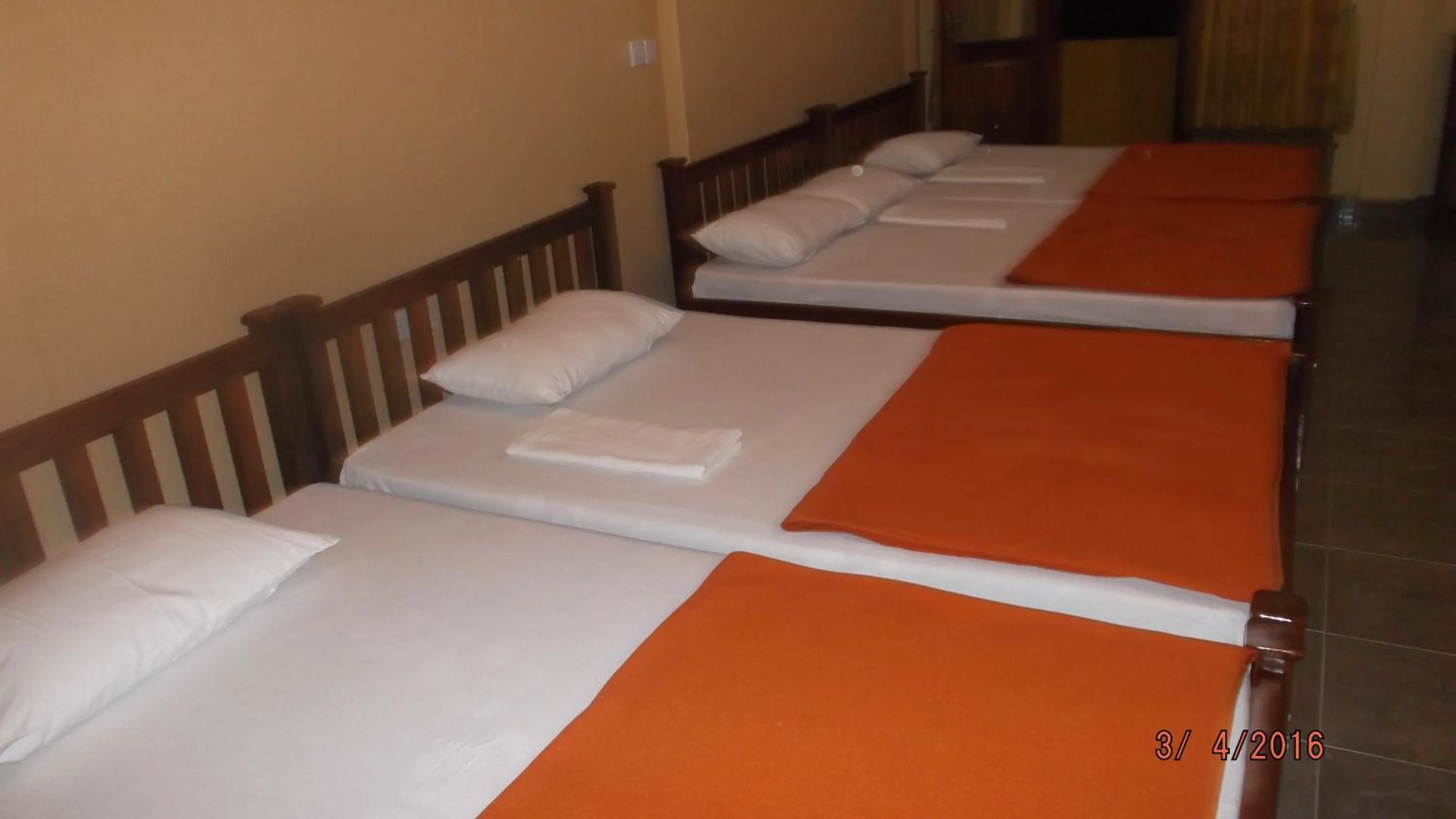 Bed in Anura Guest Inn