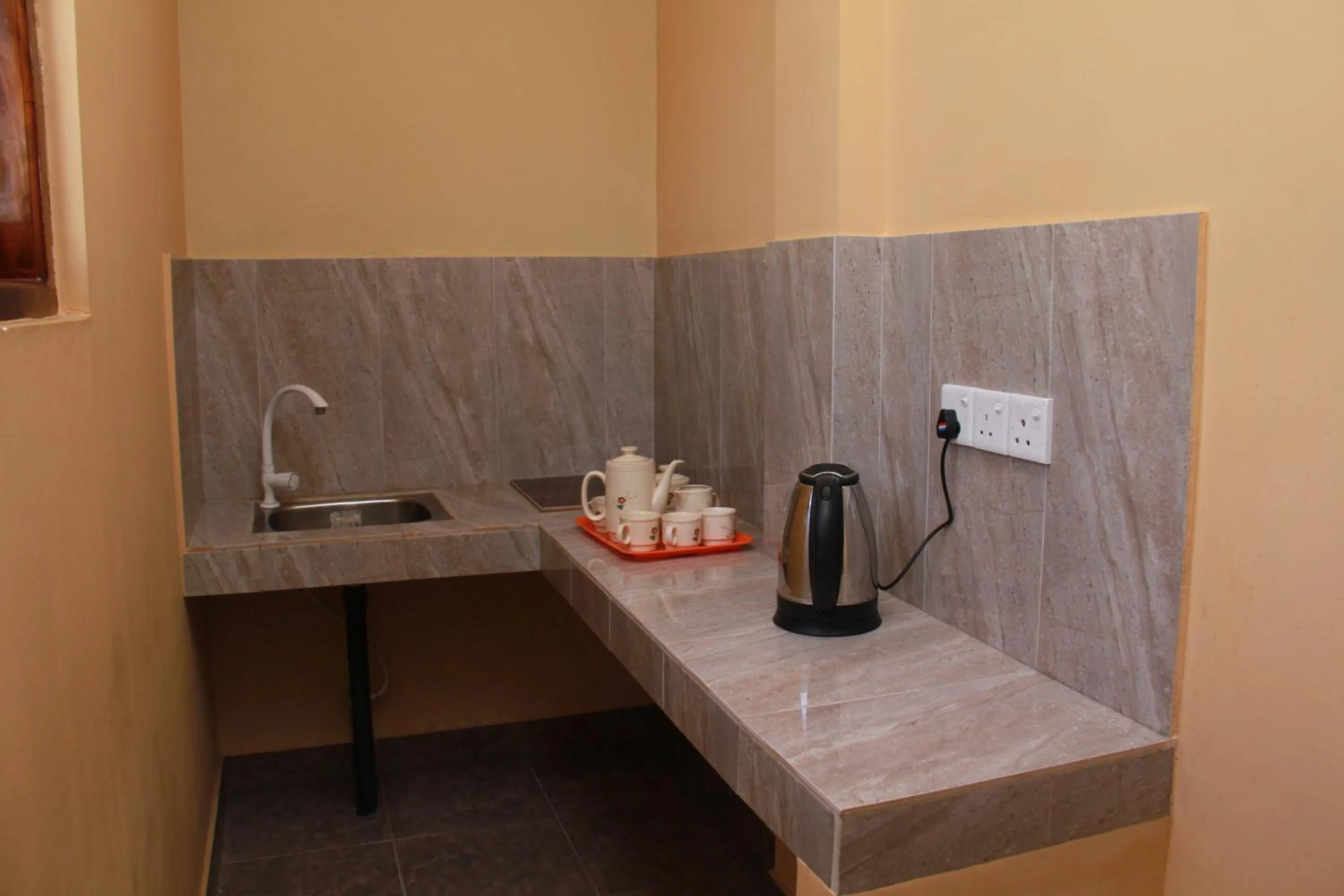 Kitchen or kitchenette in Anura Guest Inn
