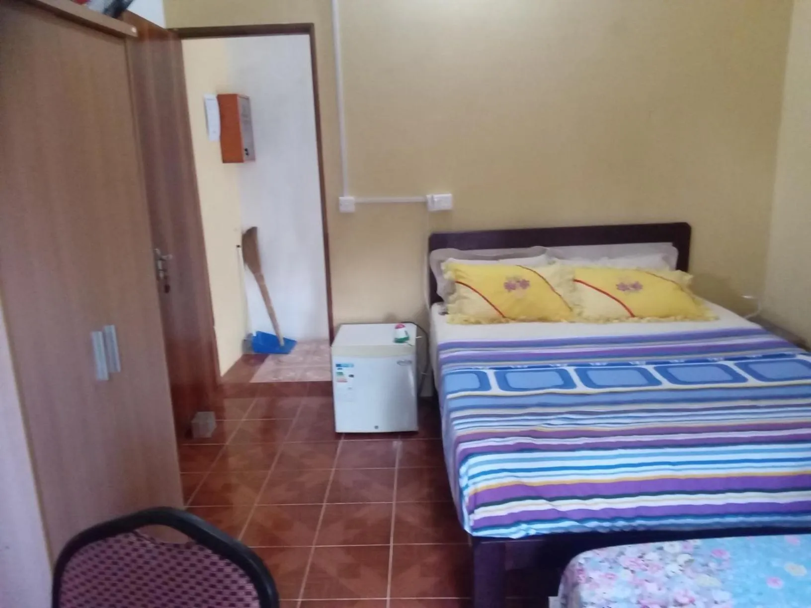 Bed in Chez Ronald Guest House