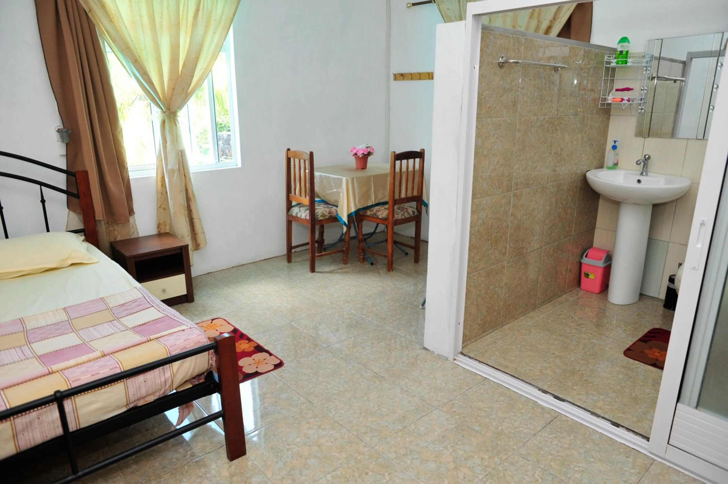 Photo of the whole room in Chez Ronald Guest House