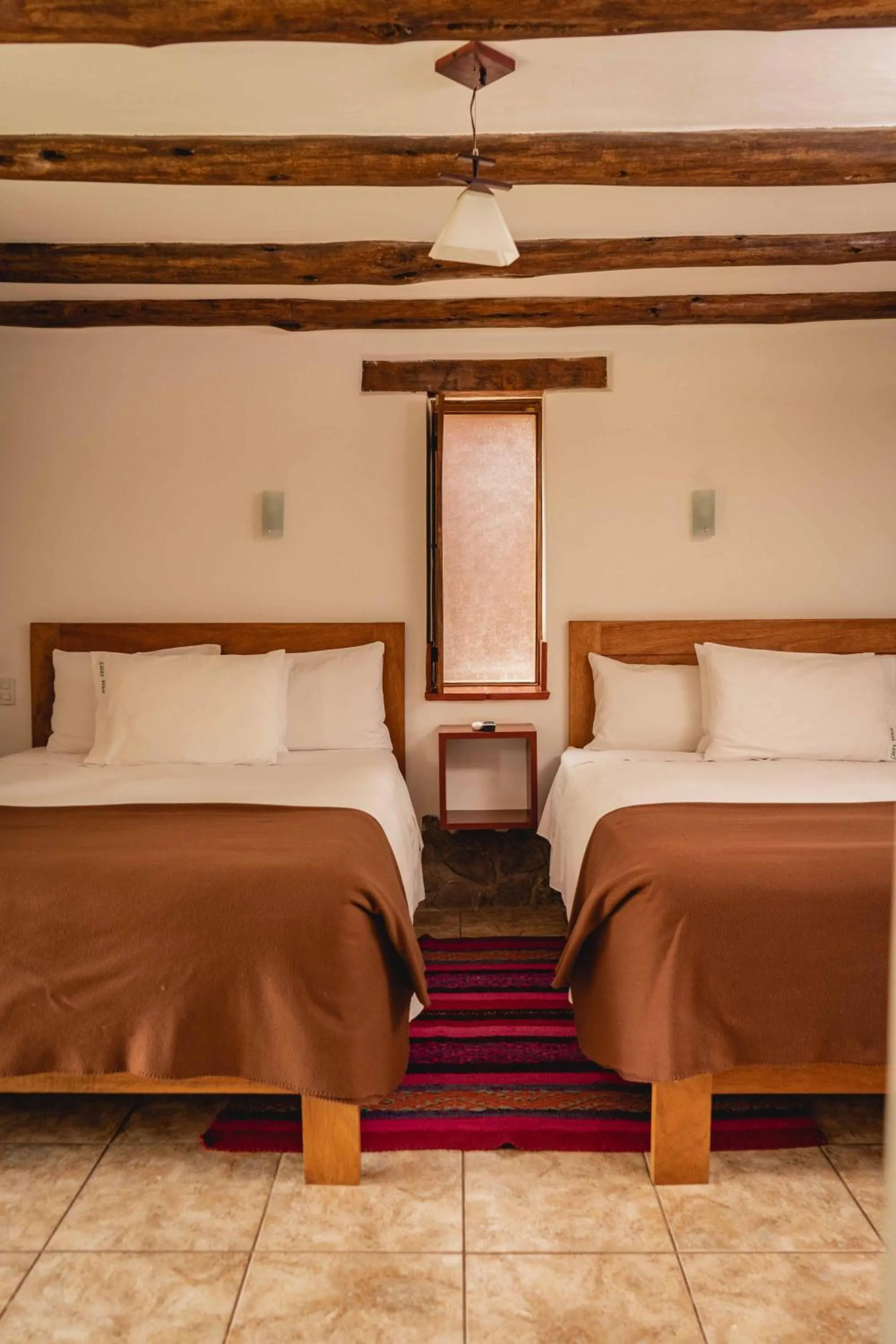 Decorative detail, Bed in Lizzy Wasi Urubamba