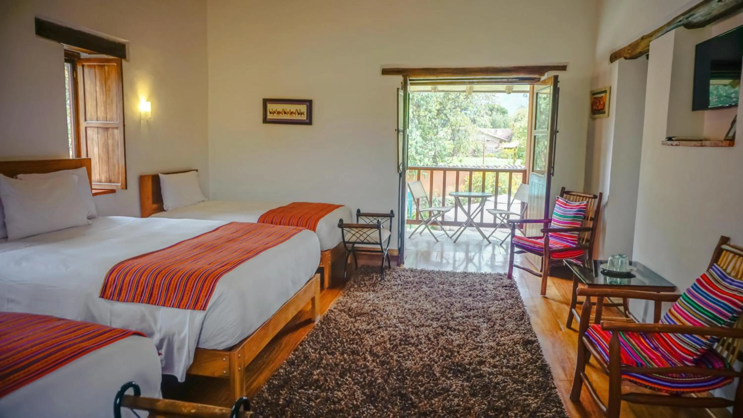 Photo of the whole room, Bed in Lizzy Wasi Urubamba
