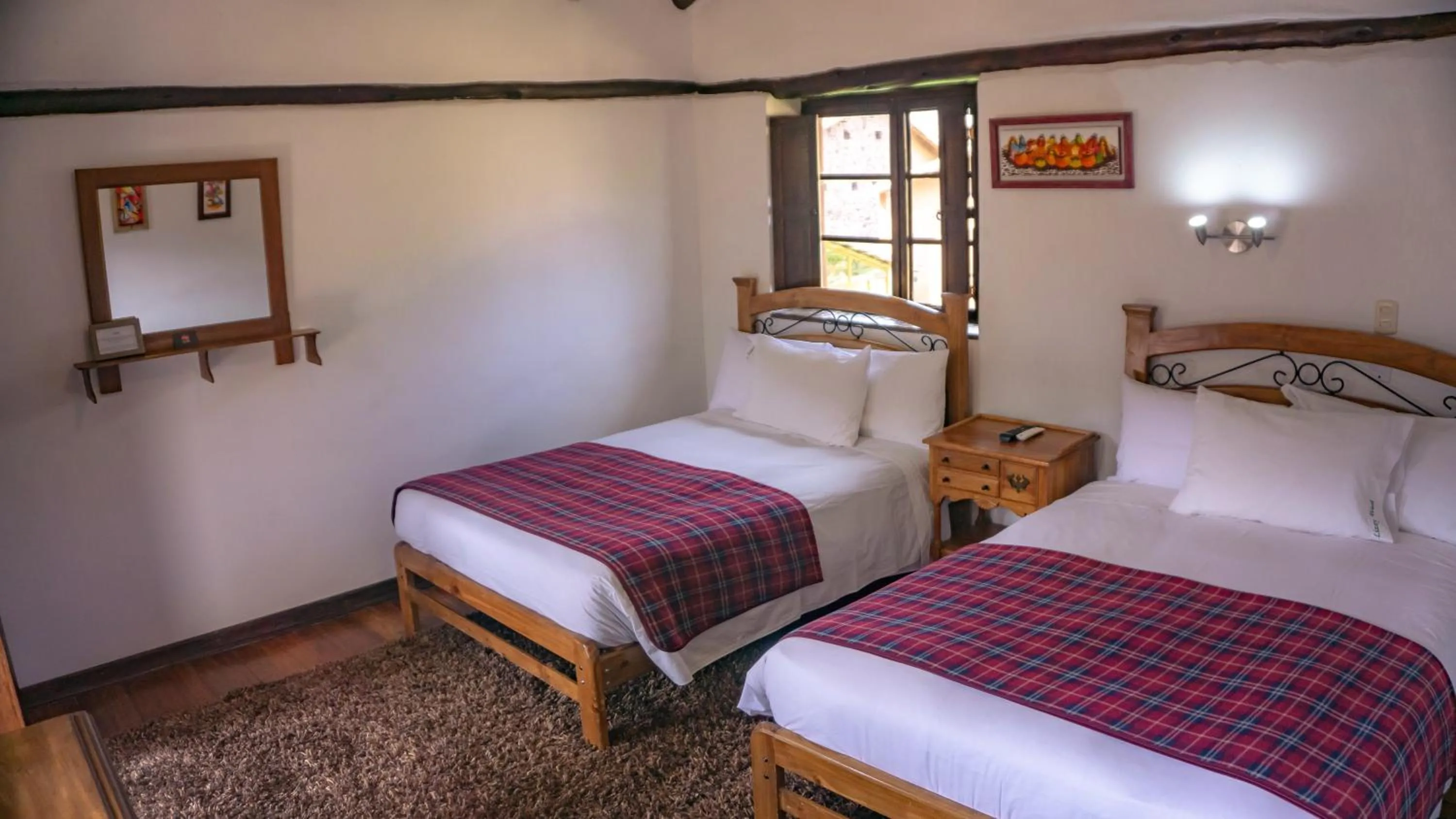 Photo of the whole room, Bed in Lizzy Wasi Urubamba