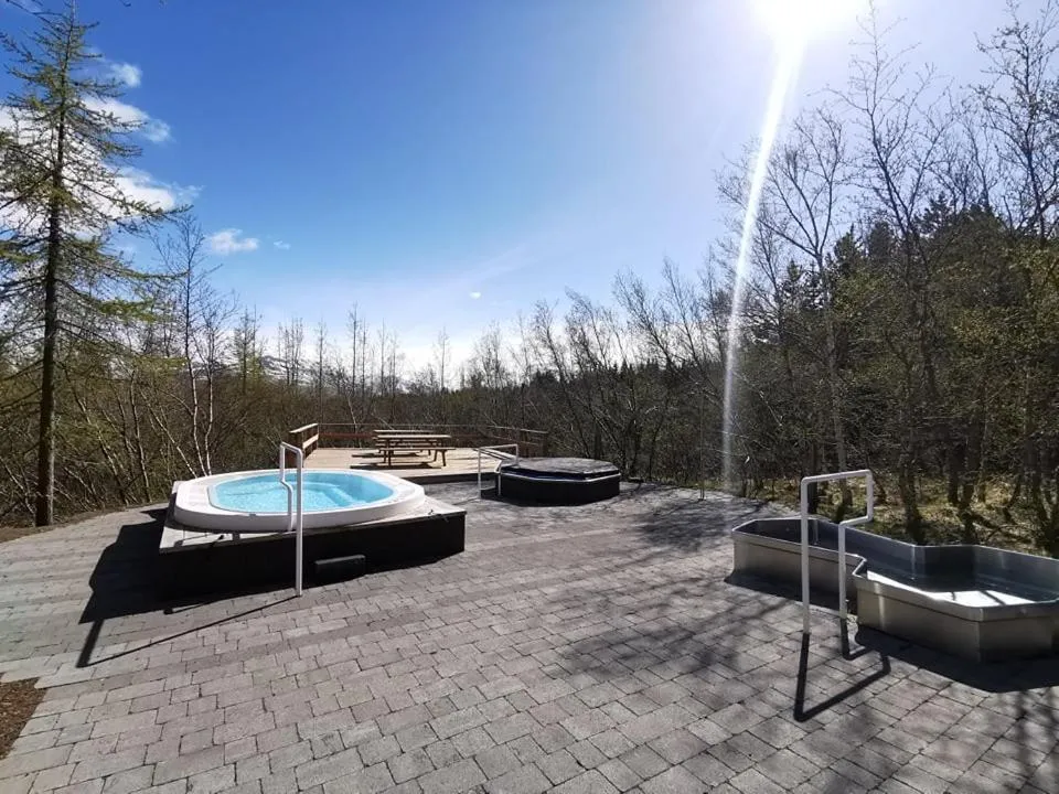 Hot Tub in Hotel Kjarnalundur- Aurora Dream - Lodges and Rooms