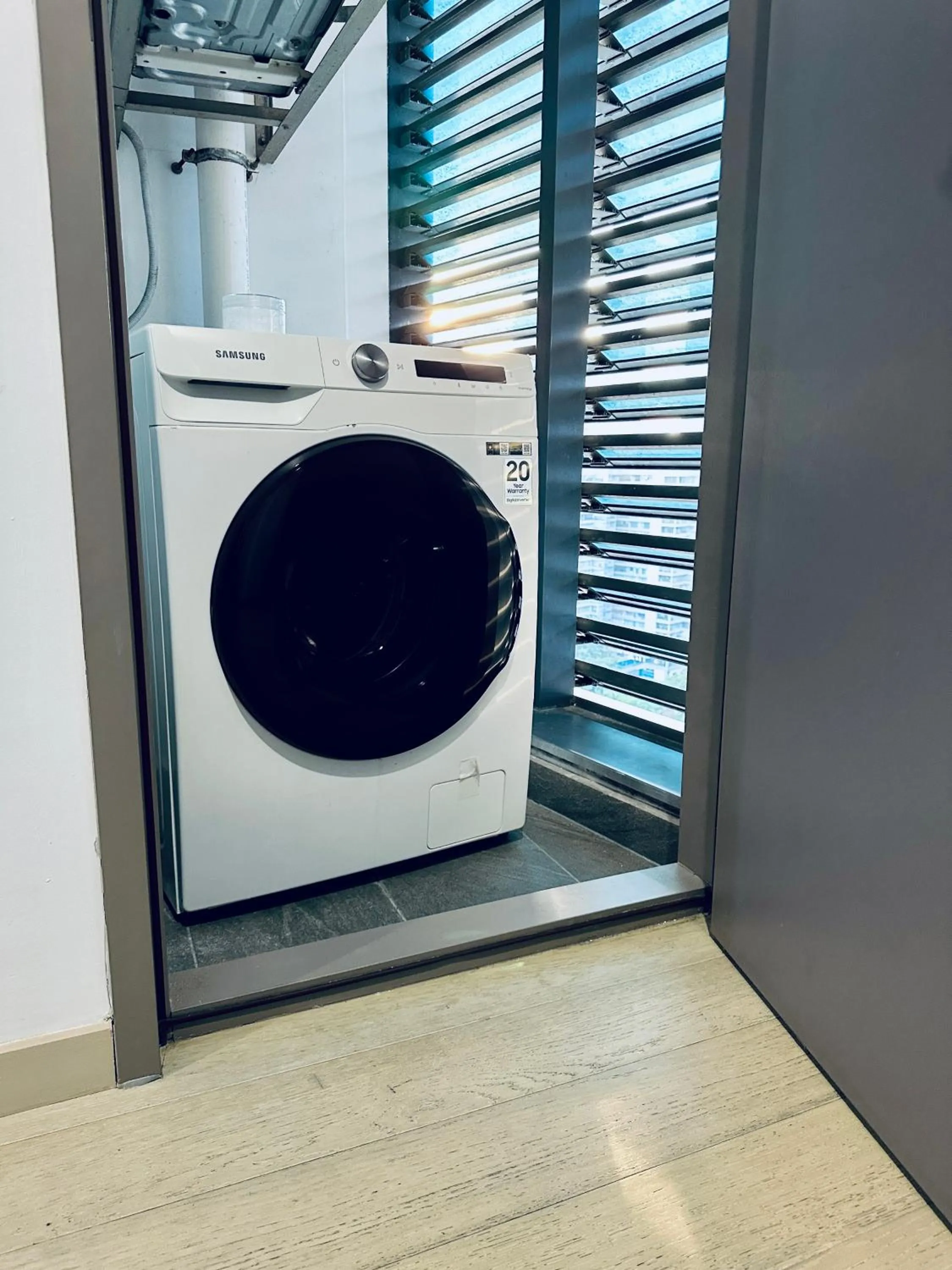 washing machine in Eaton Residences By Luna