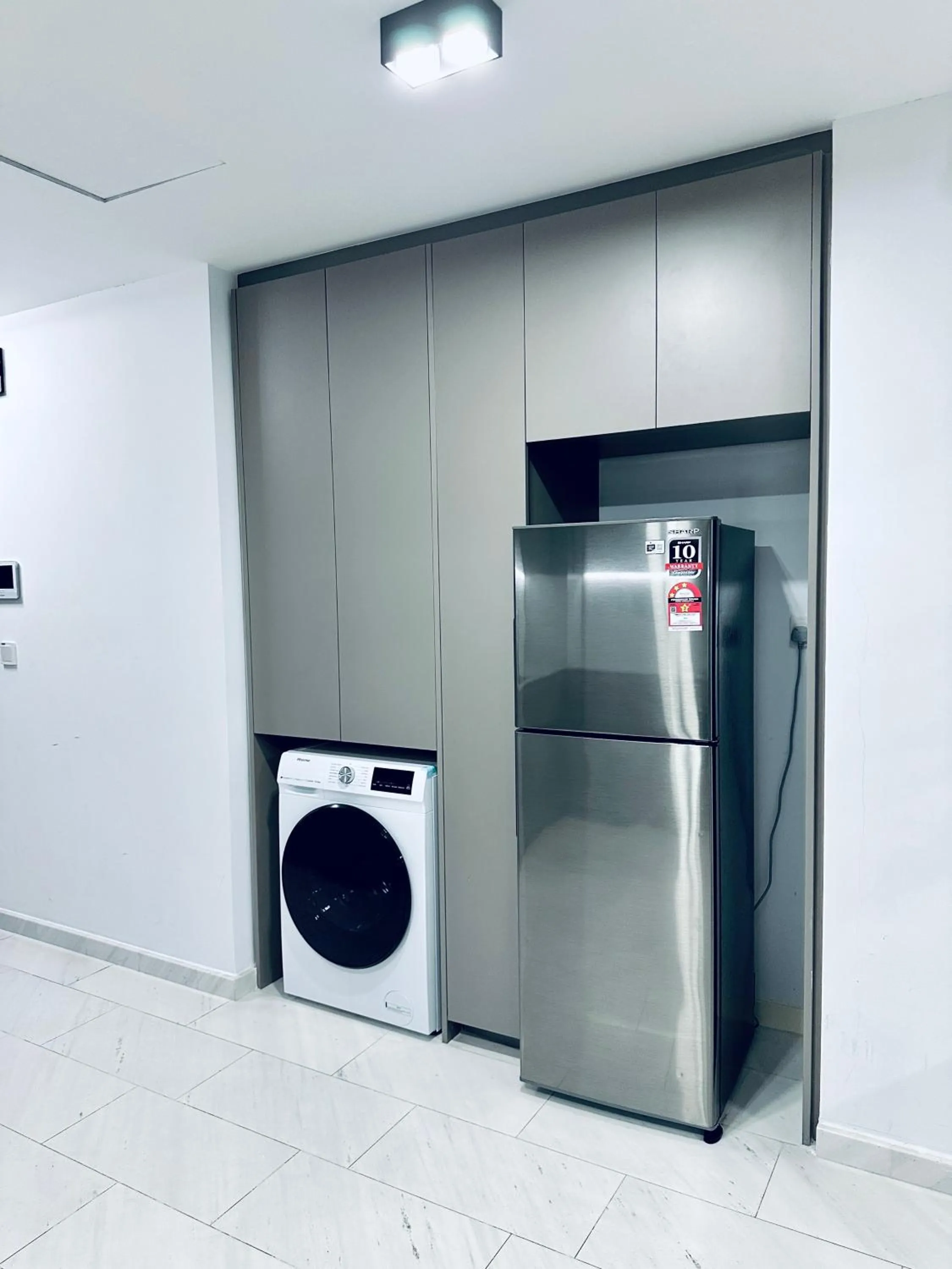 washing machine in Eaton Residences By Luna