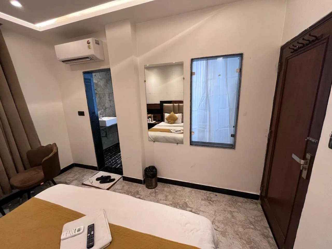 Bedroom in Hotel Delhi Empire Dx