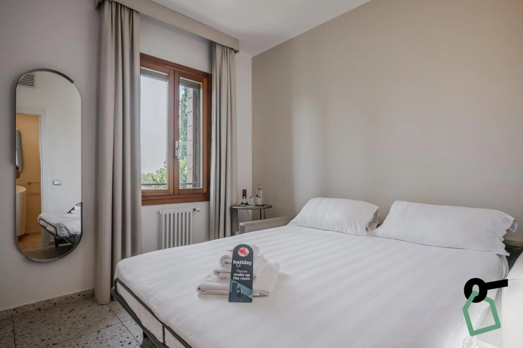 Bed in Hotiday Venezia Cape