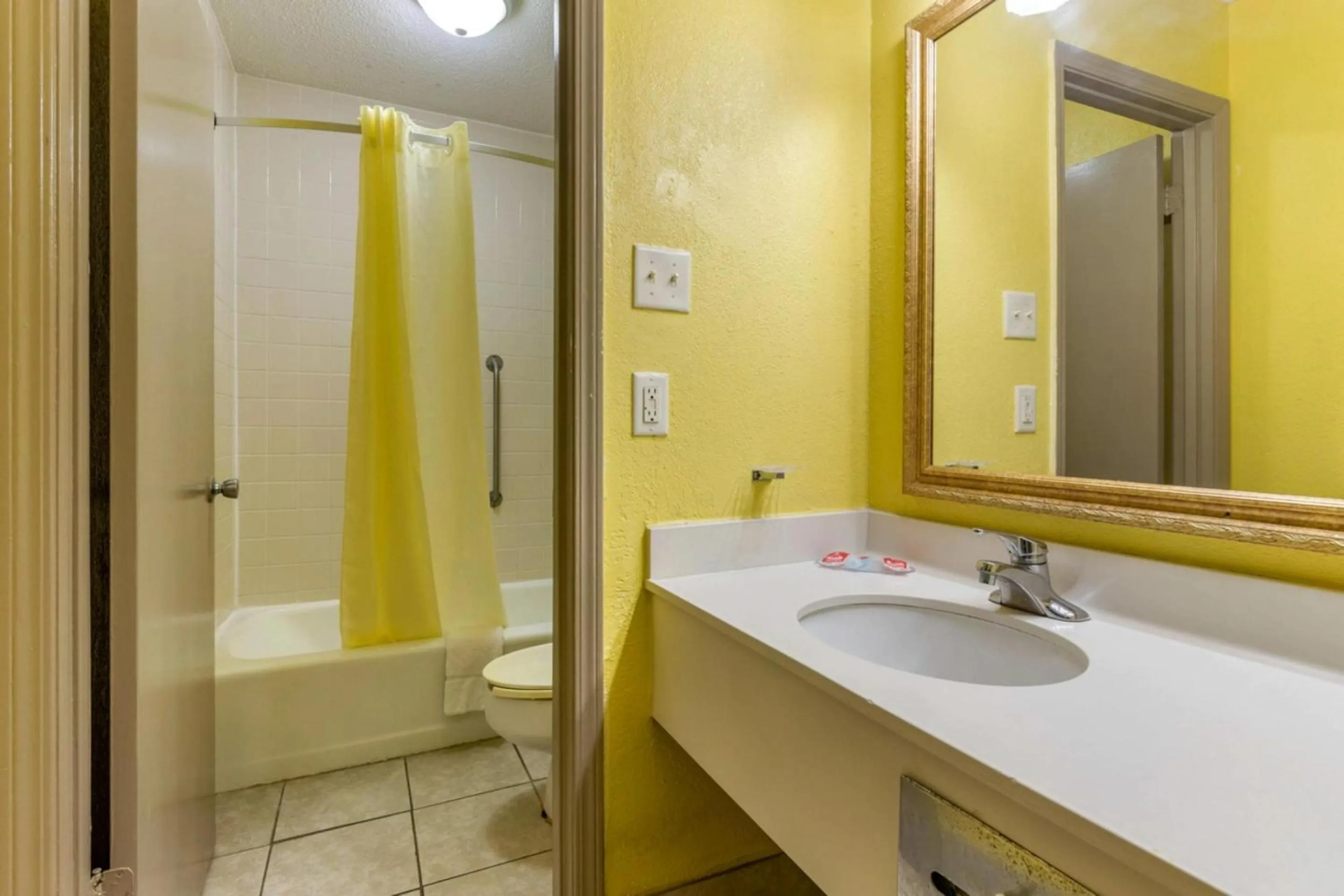 Bathroom in Travelers Inn Douglas By OYO US-441