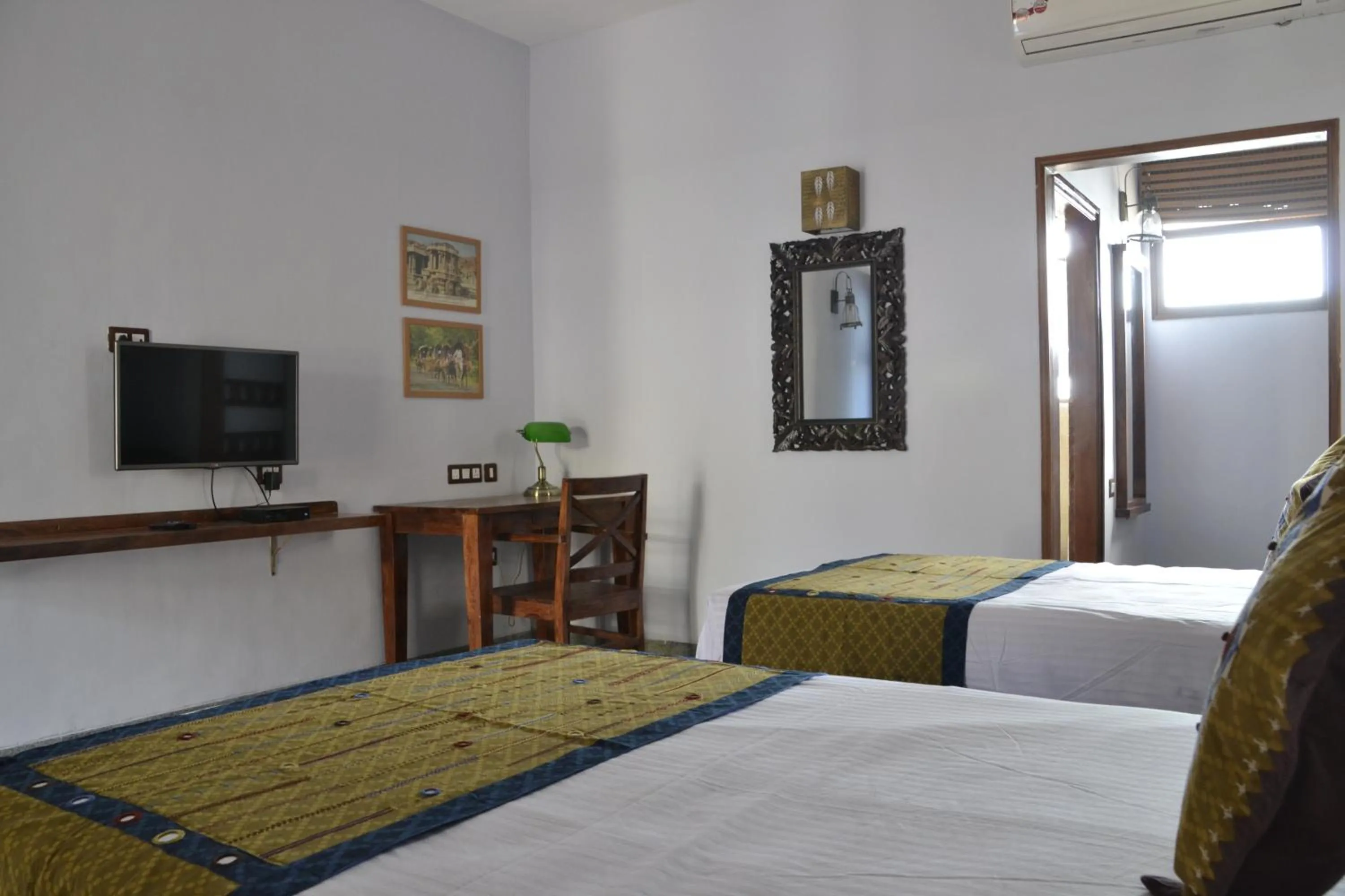 Bed in Heritage Resort Hampi