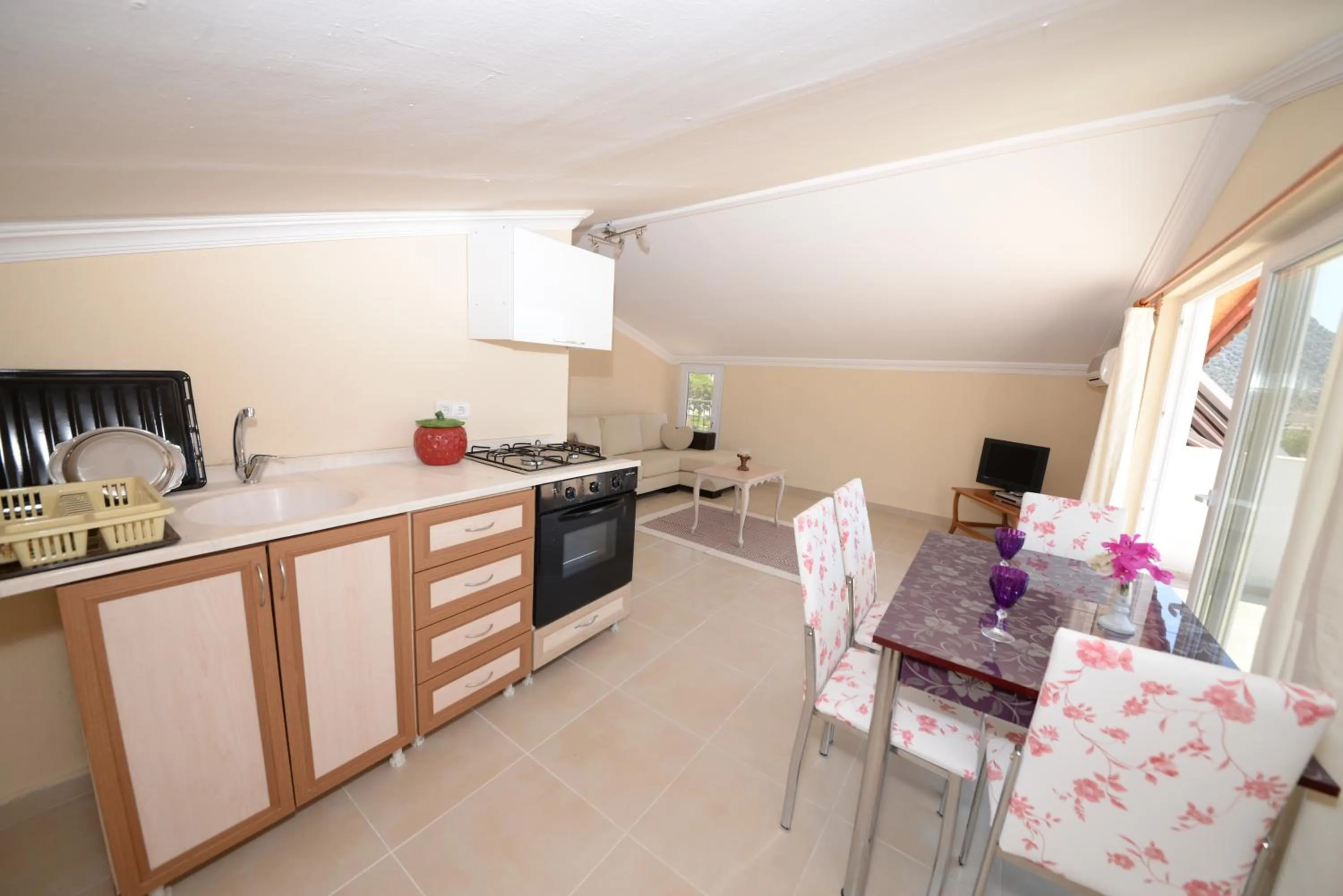 Kitchen or kitchenette in Neruda Hotel