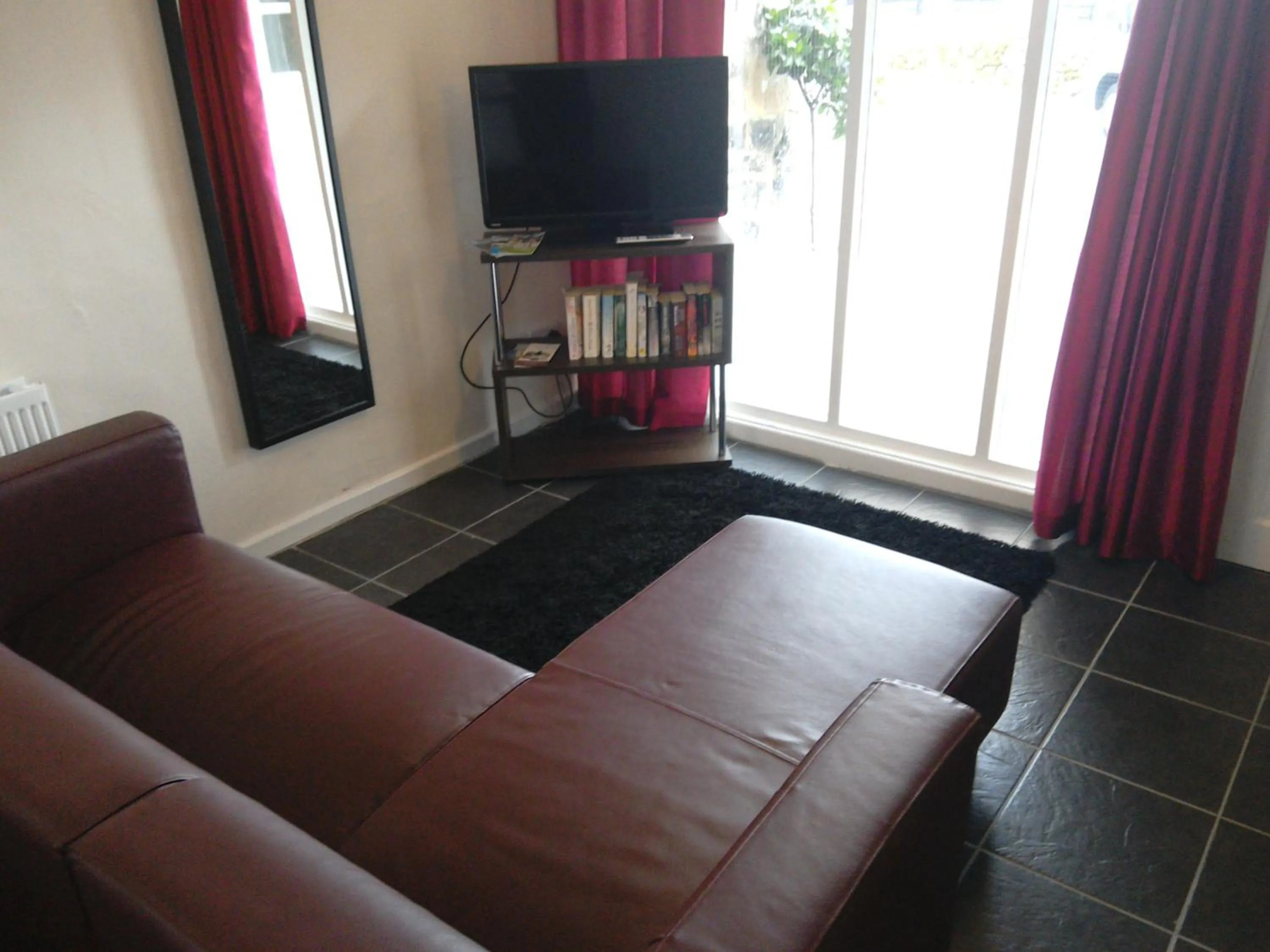 Communal lounge/ TV room in Old Coach House At The Golden Lion